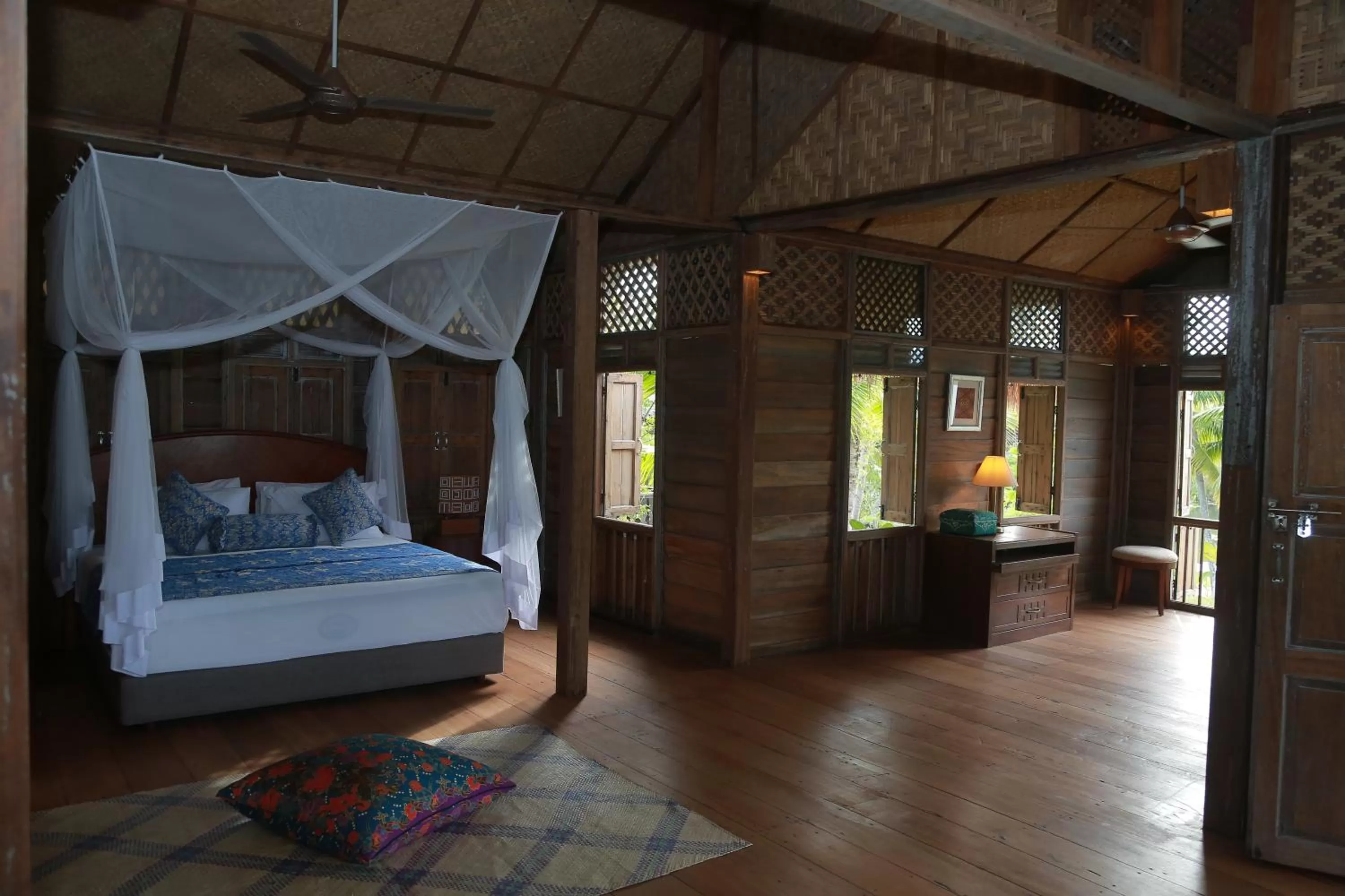 Bed in Kunang Kunang Heritage Villas