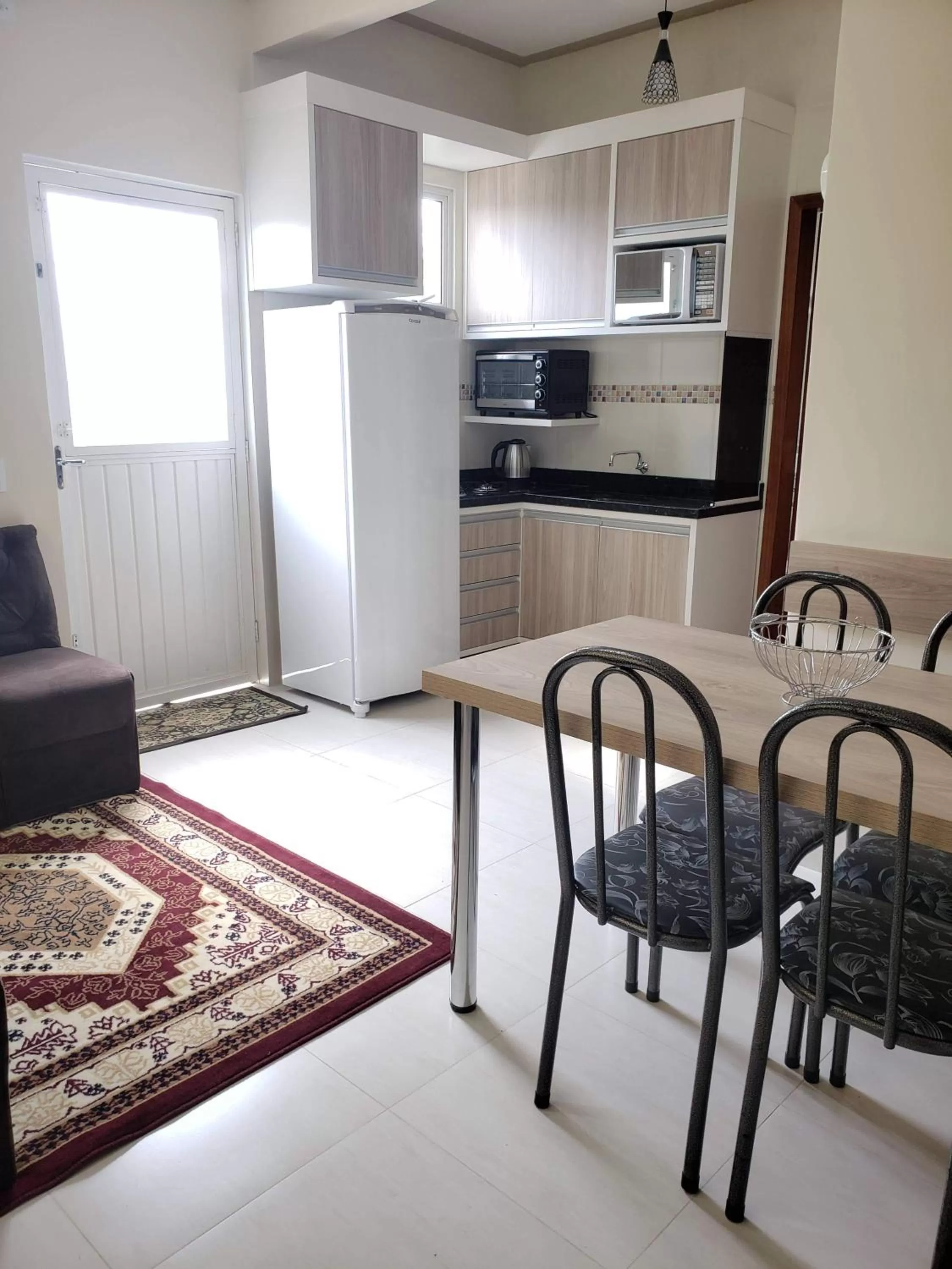Communal kitchen in Felipe Family Houses - Casas de temporada