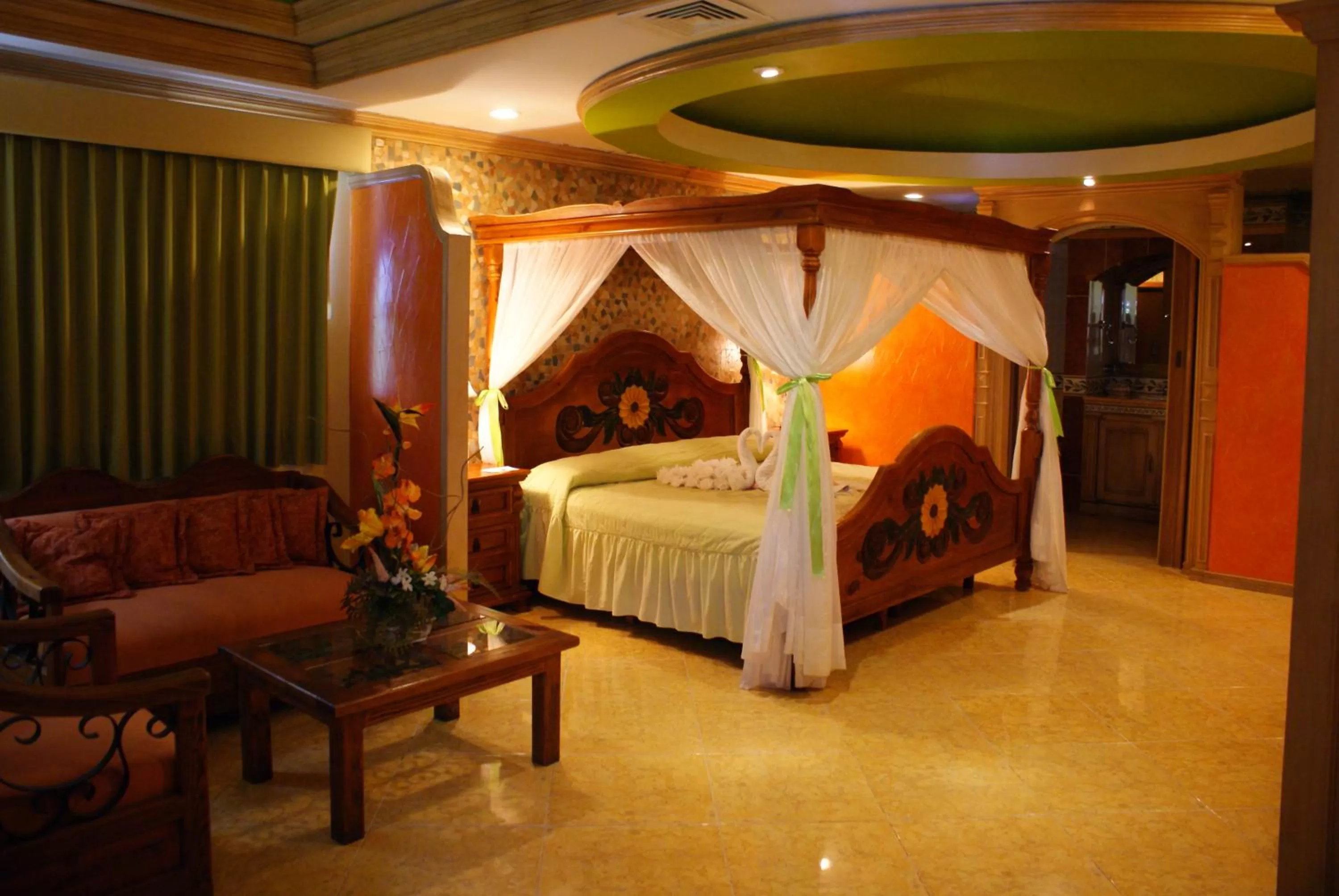 Photo of the whole room, Bed in Suites Flamboyanes