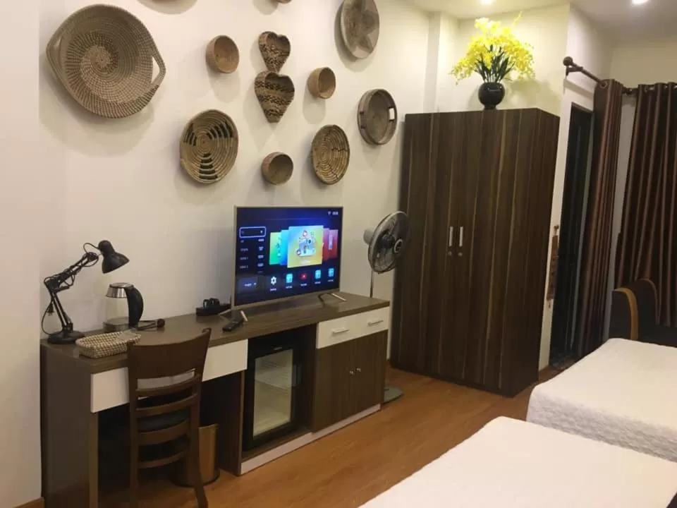 Bed in Friendly Home Hotel