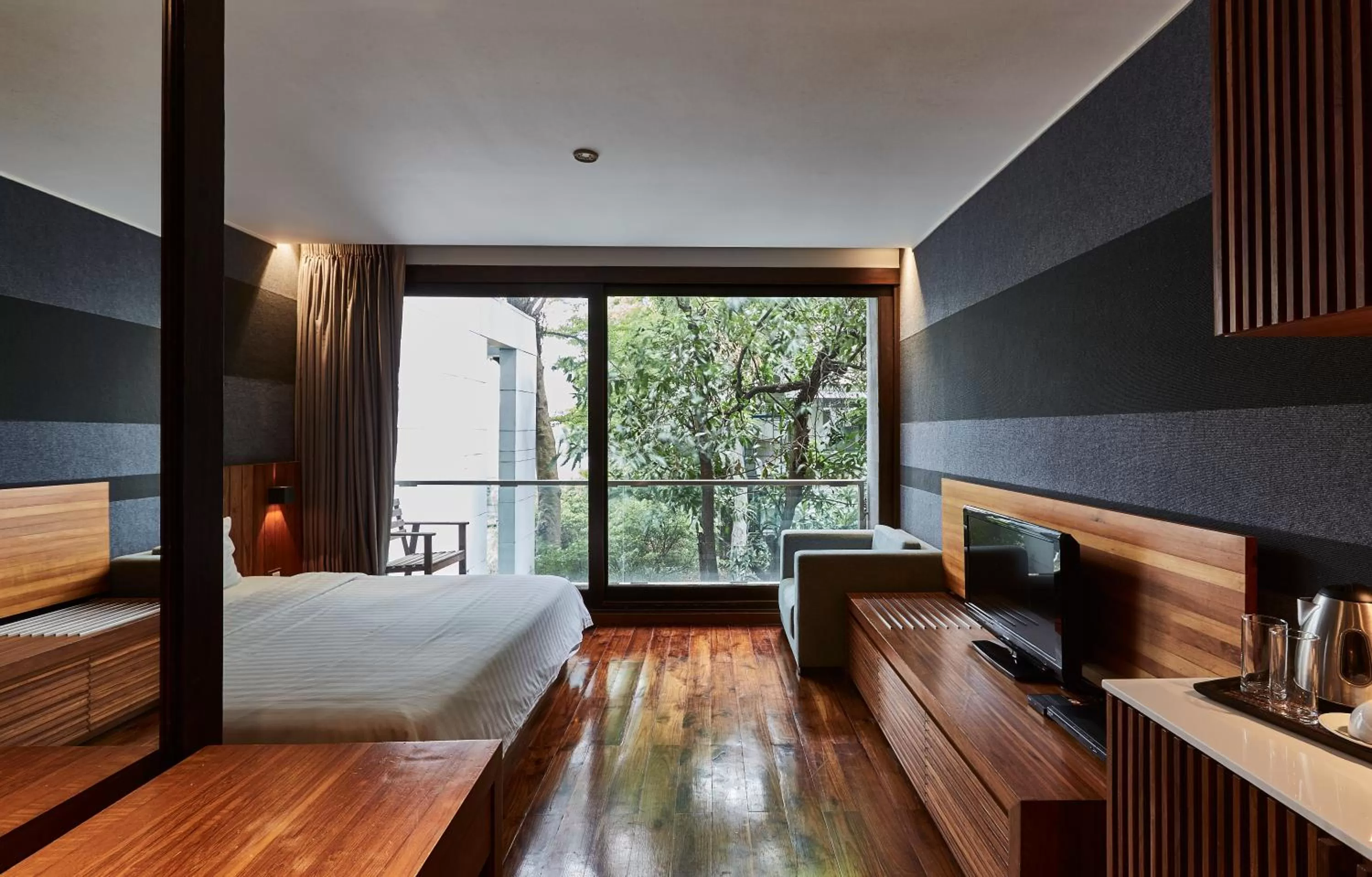 Bed in LUXX Langsuan Hotel - SHA Plus