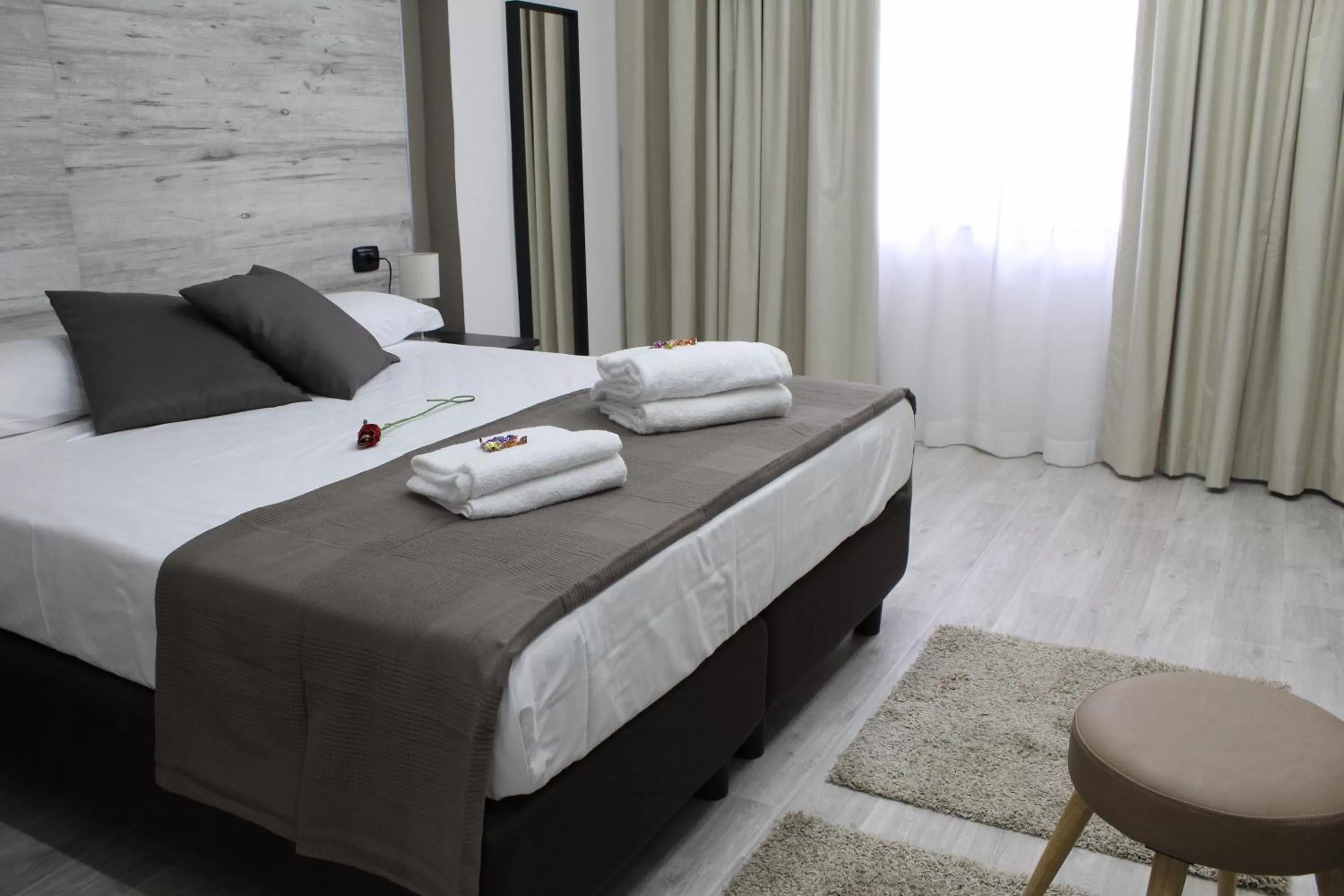 Bed in Royalty Rooms & Spa