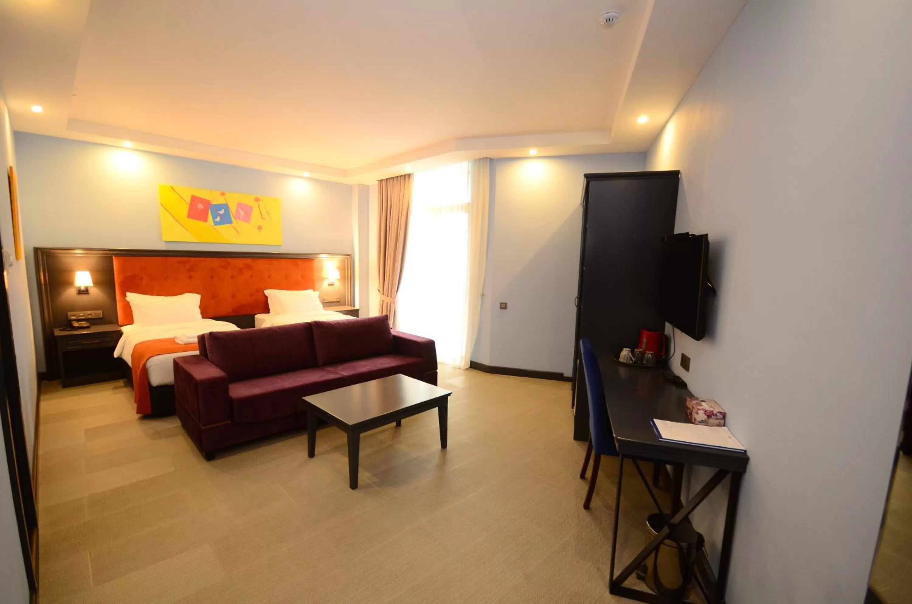 Communal lounge/ TV room, TV/Entertainment Center in Batumi Palm Hotel