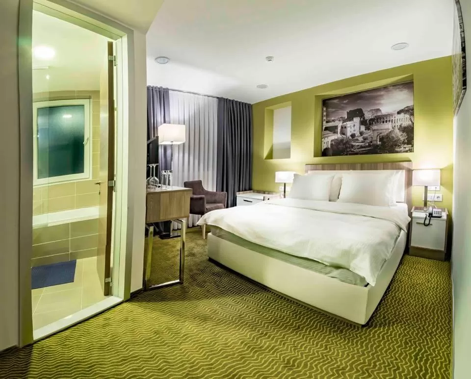 Photo of the whole room, Bed in Central Hotel, Fitness and Spa