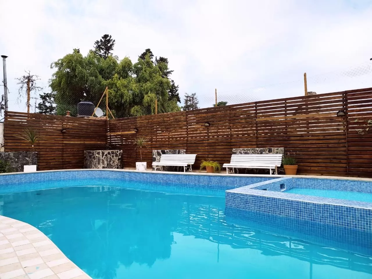 Swimming pool in Gran Lourdes Hotel by CPH