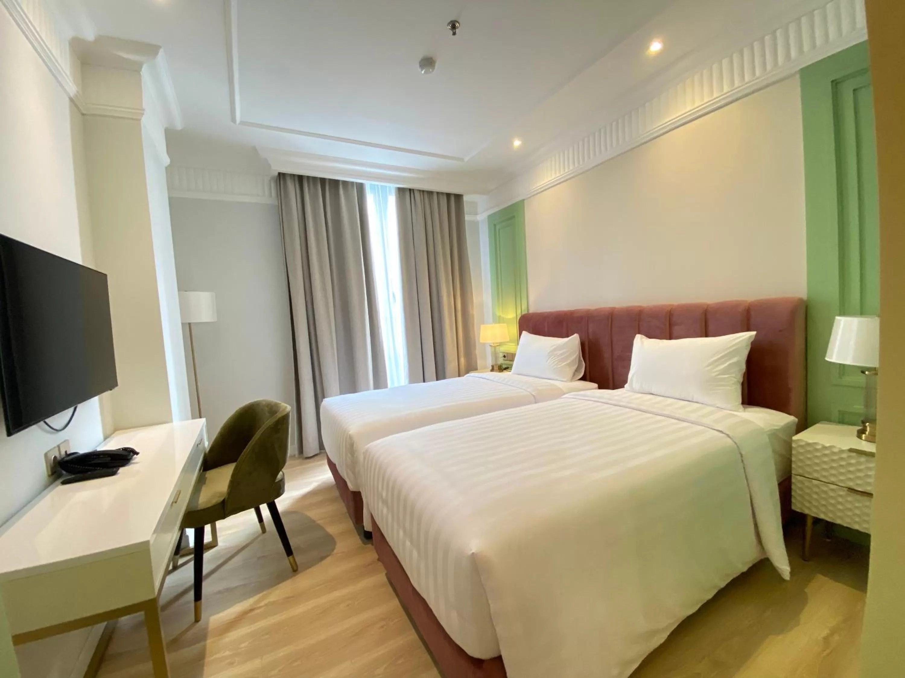 Bed in Maia Hotel Jakarta