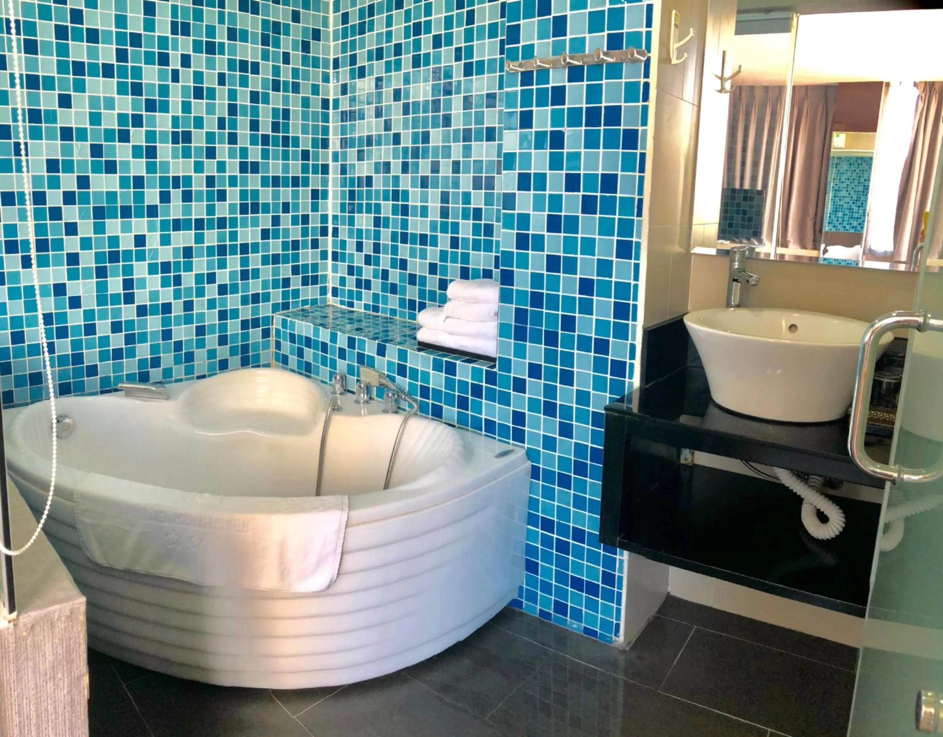 Bathroom in New Sun Hotel