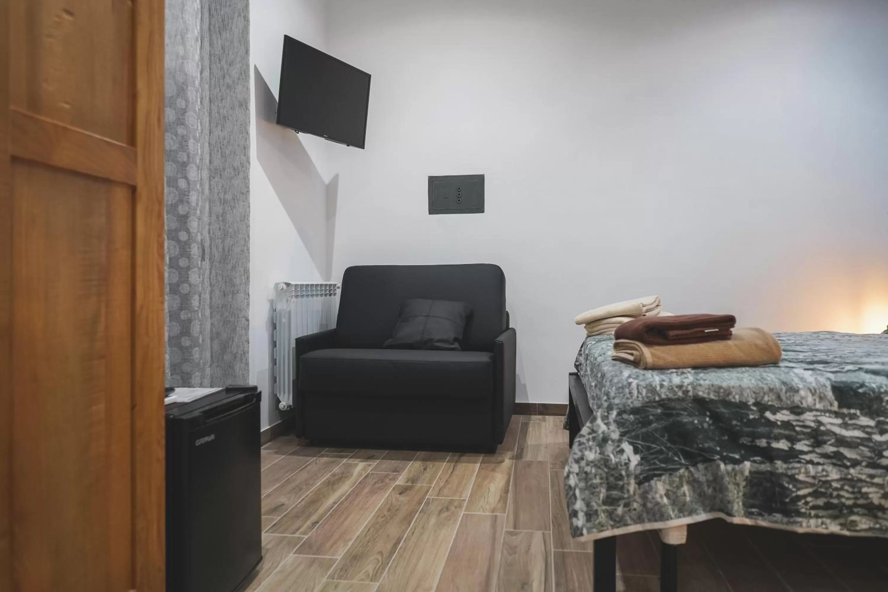 TV and multimedia, Seating Area in Ulivo Design b&b