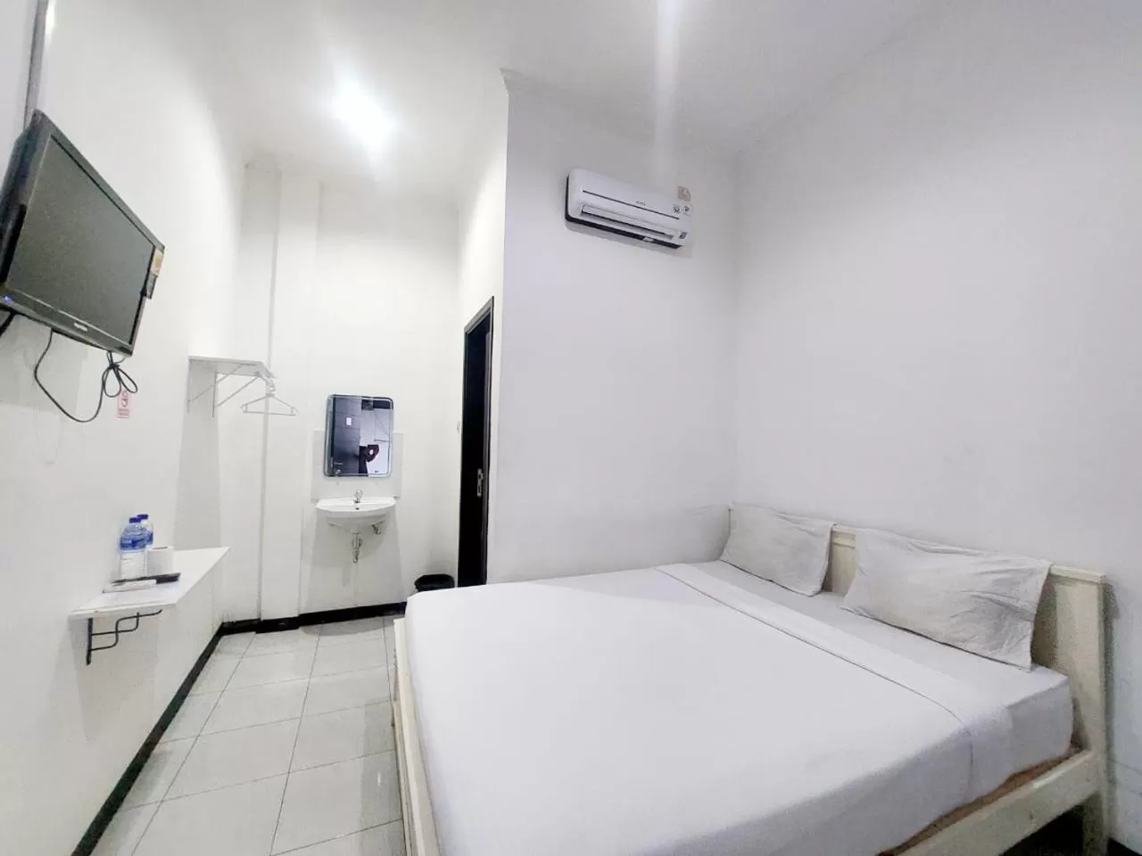 Bed in COZY STAY KUPANG