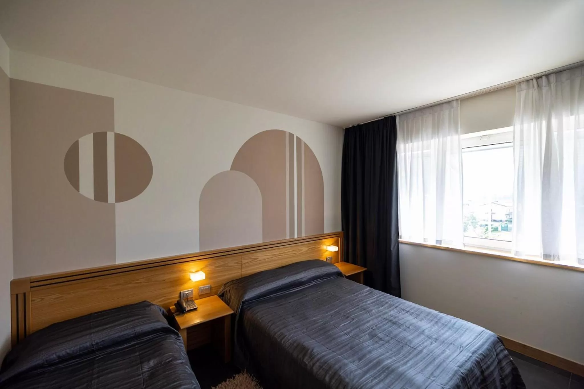 Bed in Hotel Europa Belluno