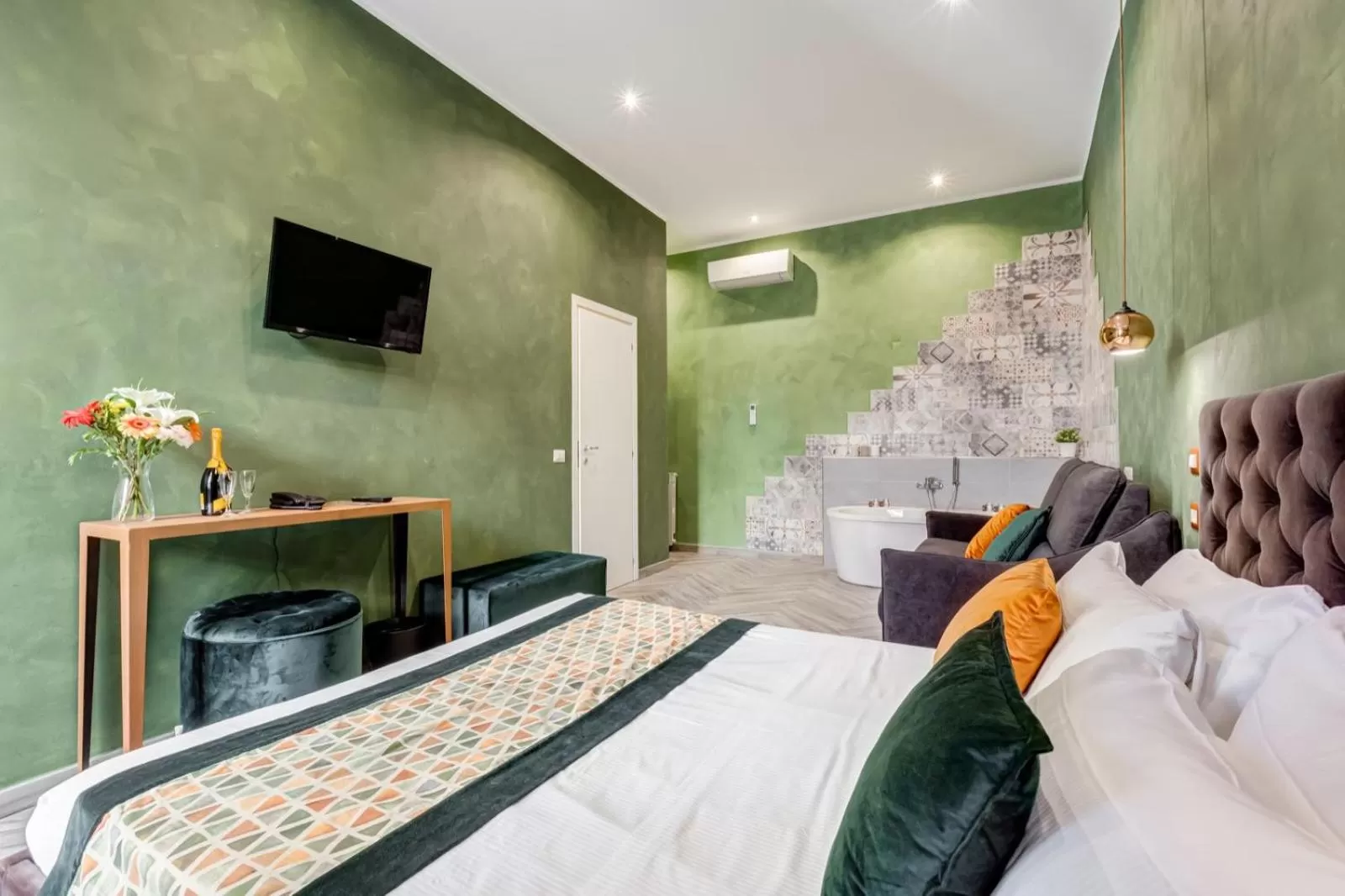 Bed in Ripetta Deluxe Suites