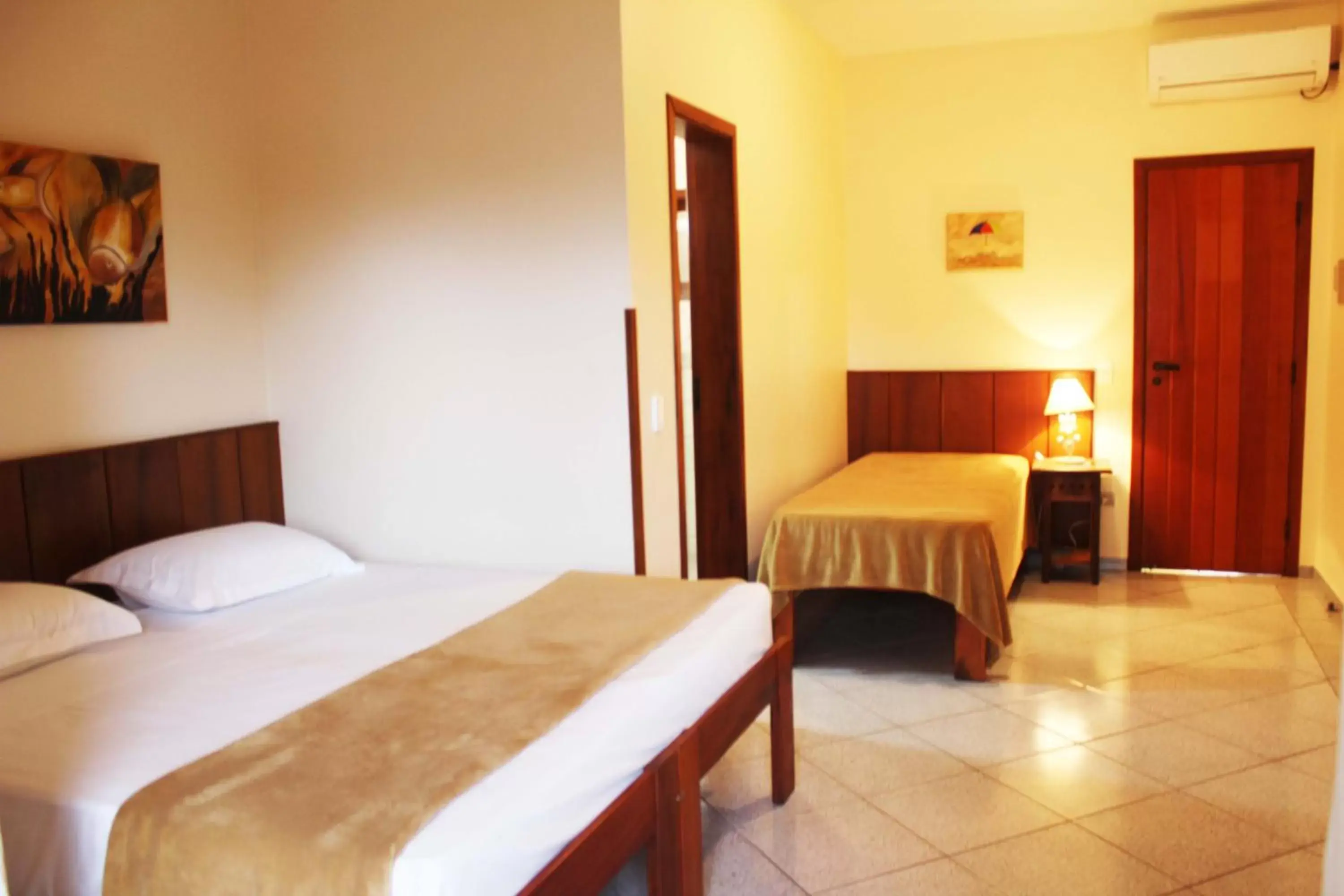 Triple Room with Balcony in Pousada Vivamar Triple Room with Balcony in Pousada Vivamar