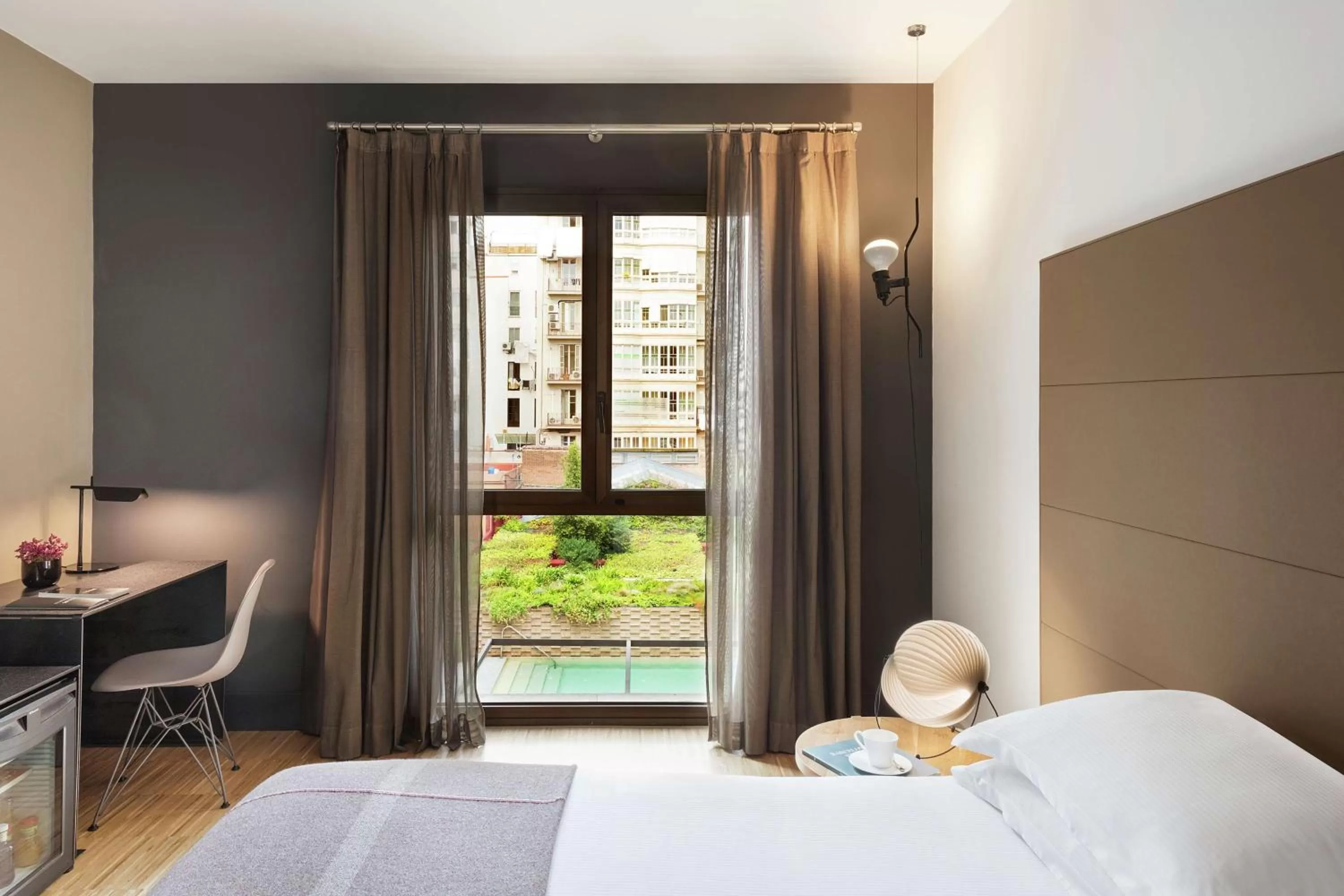 Bed in Alexandra Barcelona Hotel, Curio Collection by Hilton