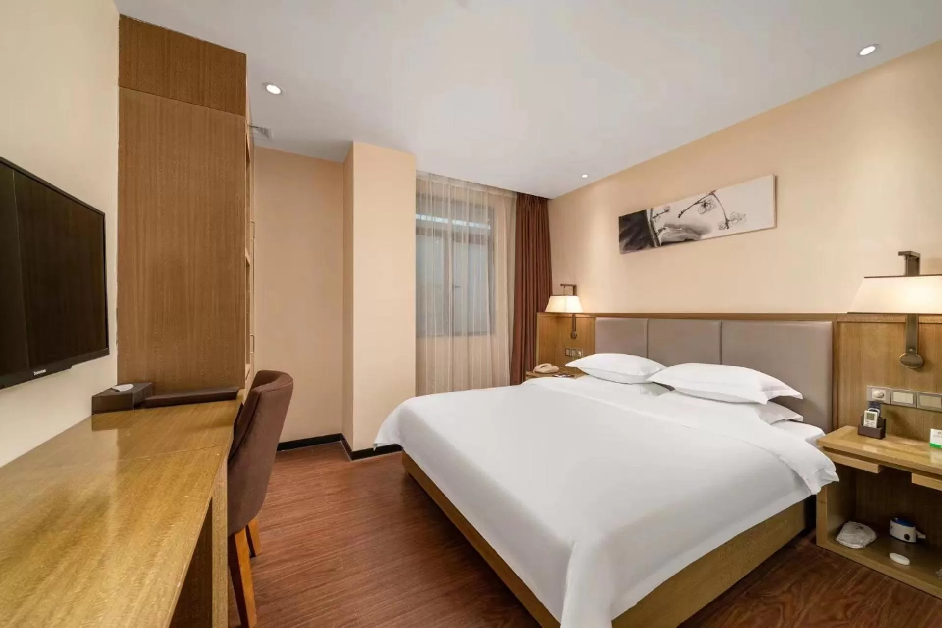 Bed in Guangzhou Boyi Hotel