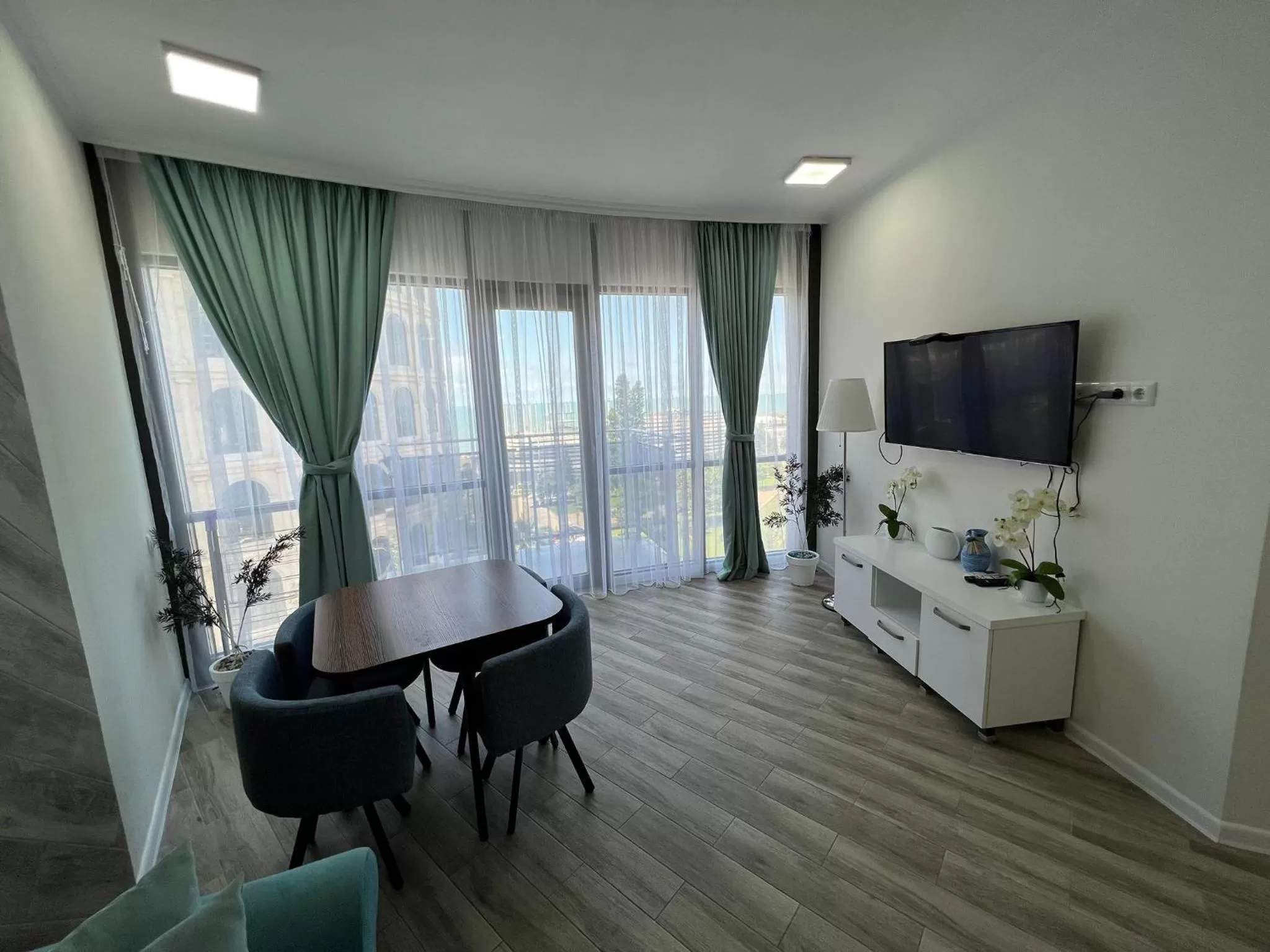 TV and multimedia, TV/Entertainment Center in Aparthotel Holiday Lux Batumi