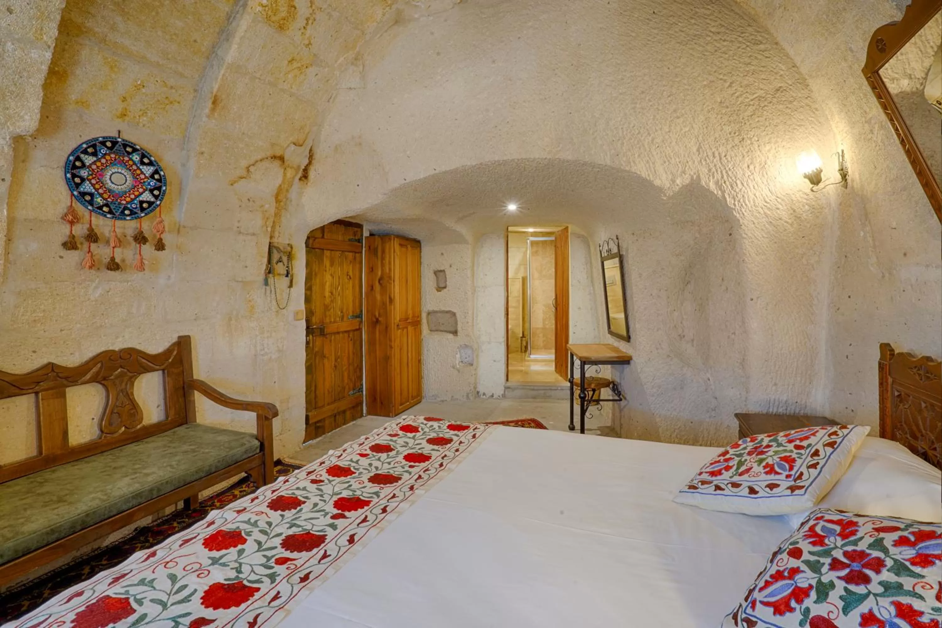 Bed in Tulip Cave Suites