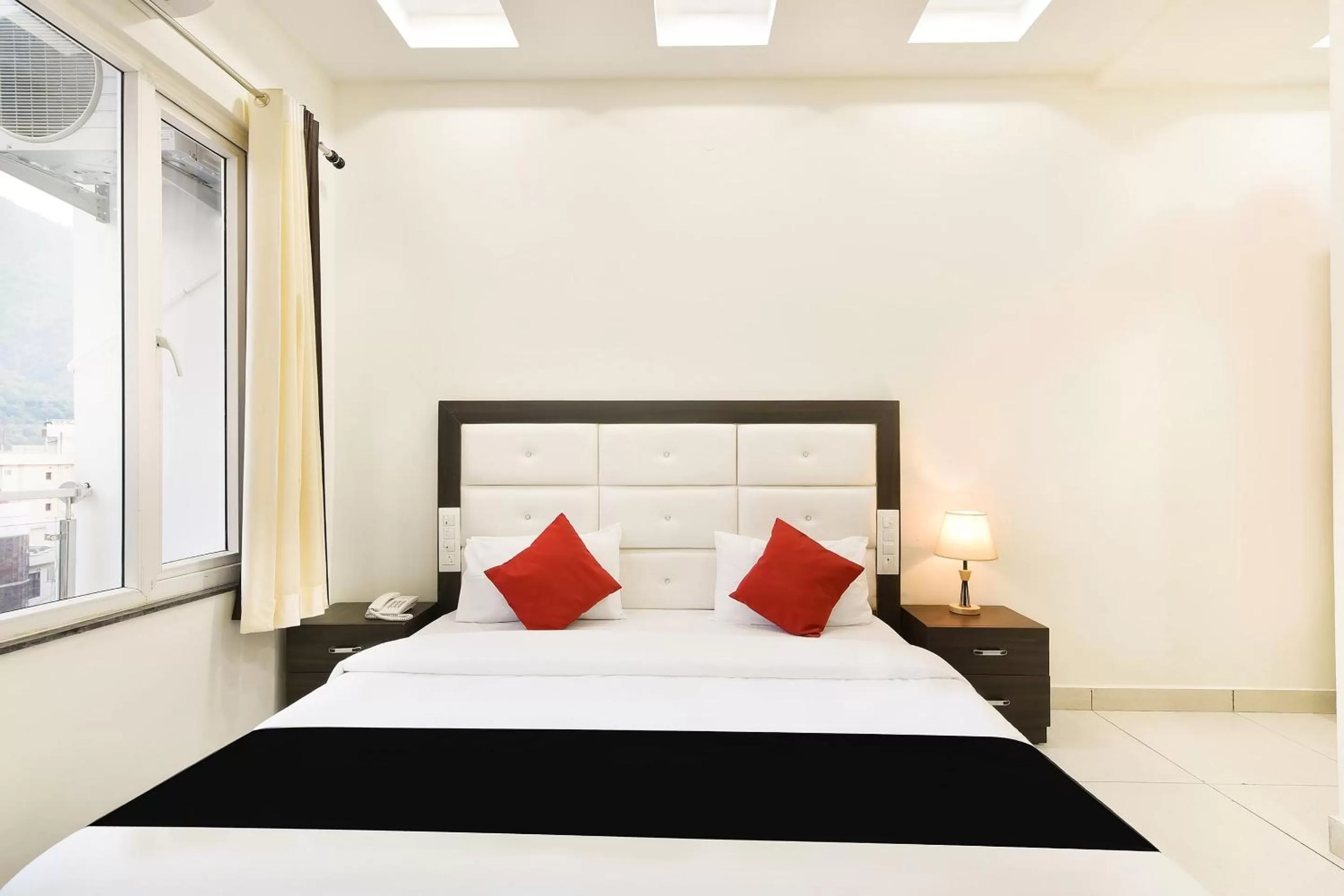 Bedroom, Bed in Capital O Yogasthali Inn Hotel And Spa