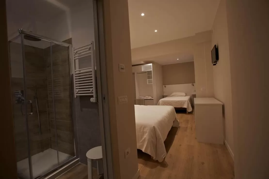 Bed in Onorati Hotel