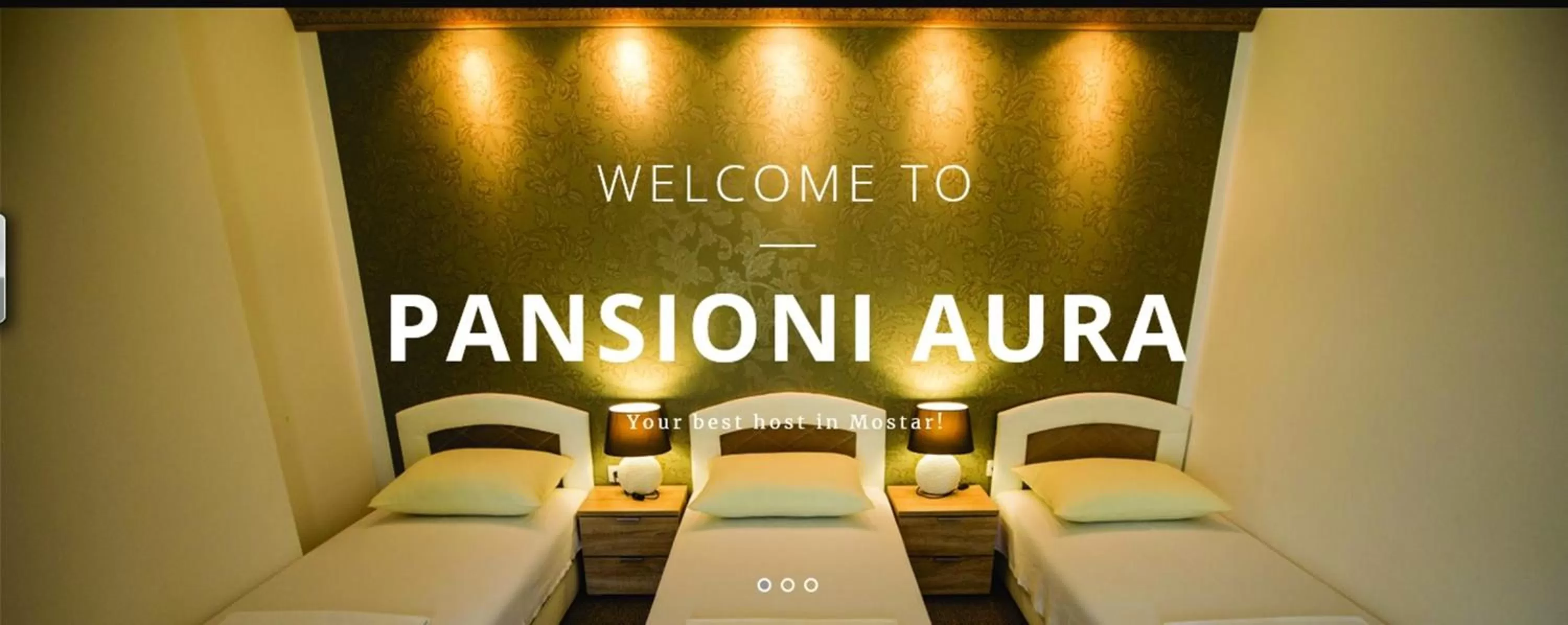 Property logo or sign in Motel Aura