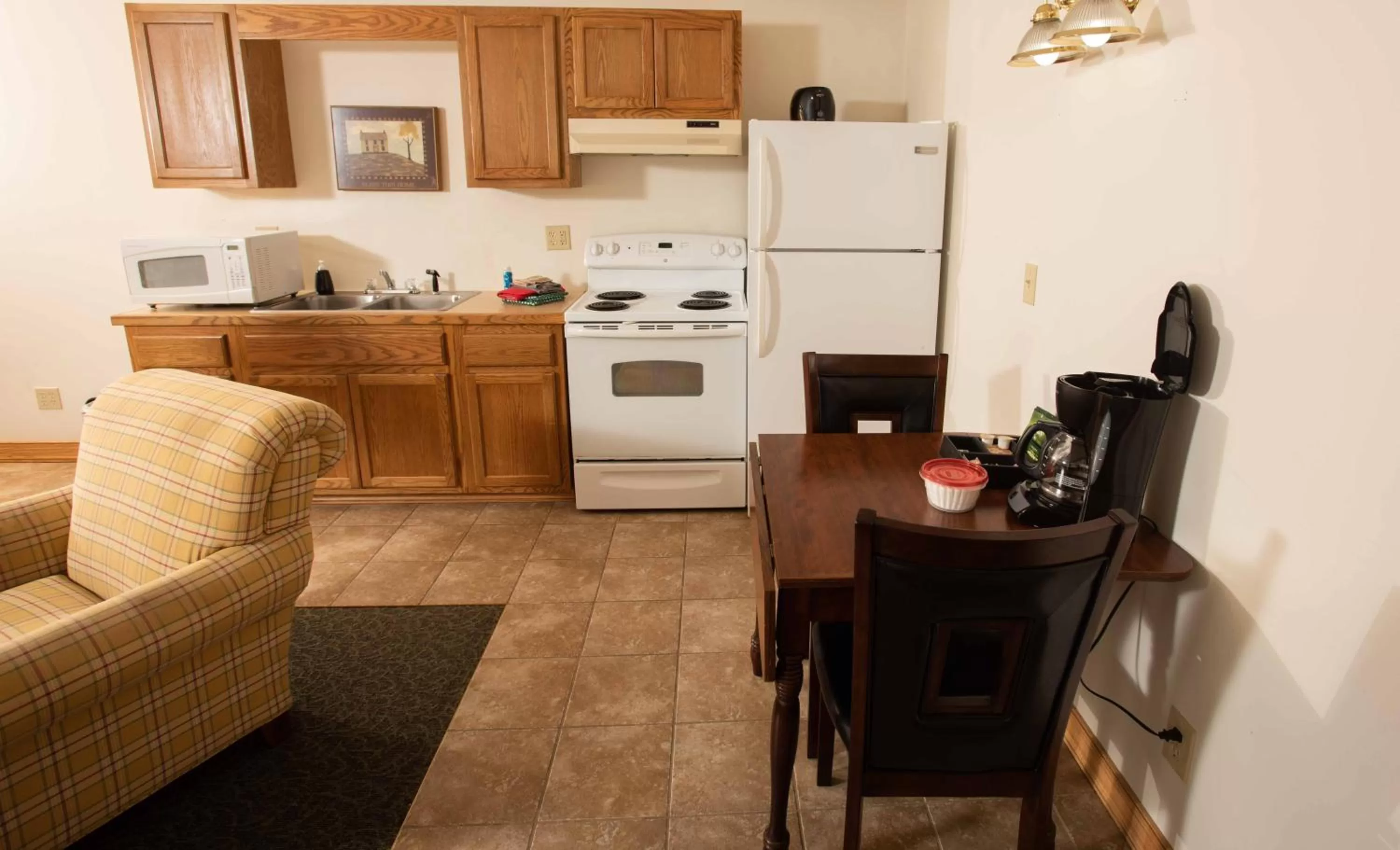 Kitchen or kitchenette in Blue Spruce Motel