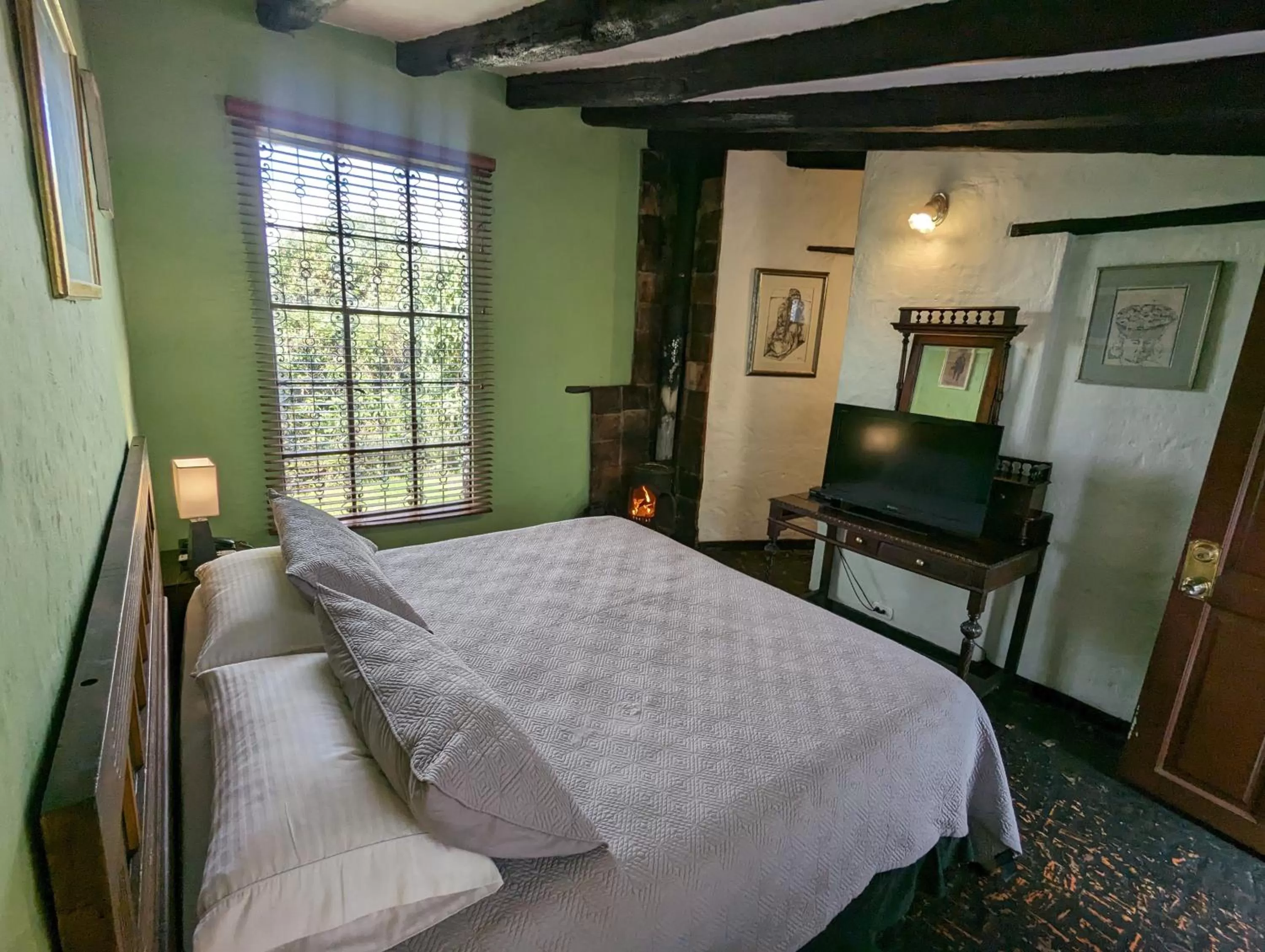 TV and multimedia, Bed in Posada Cafe La Huerta