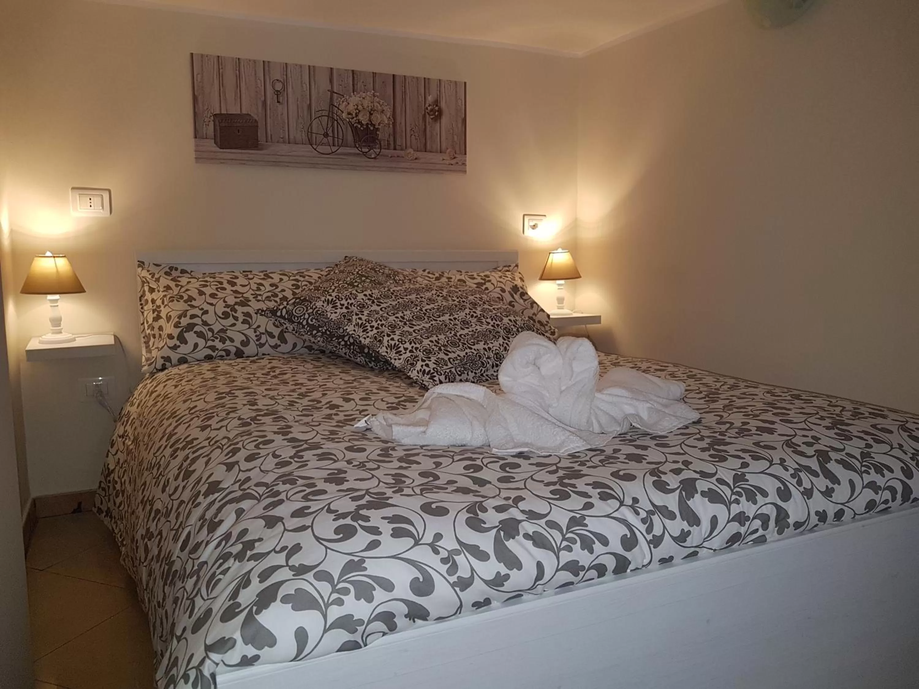 Decorative detail, Bed in Central Suites Catania