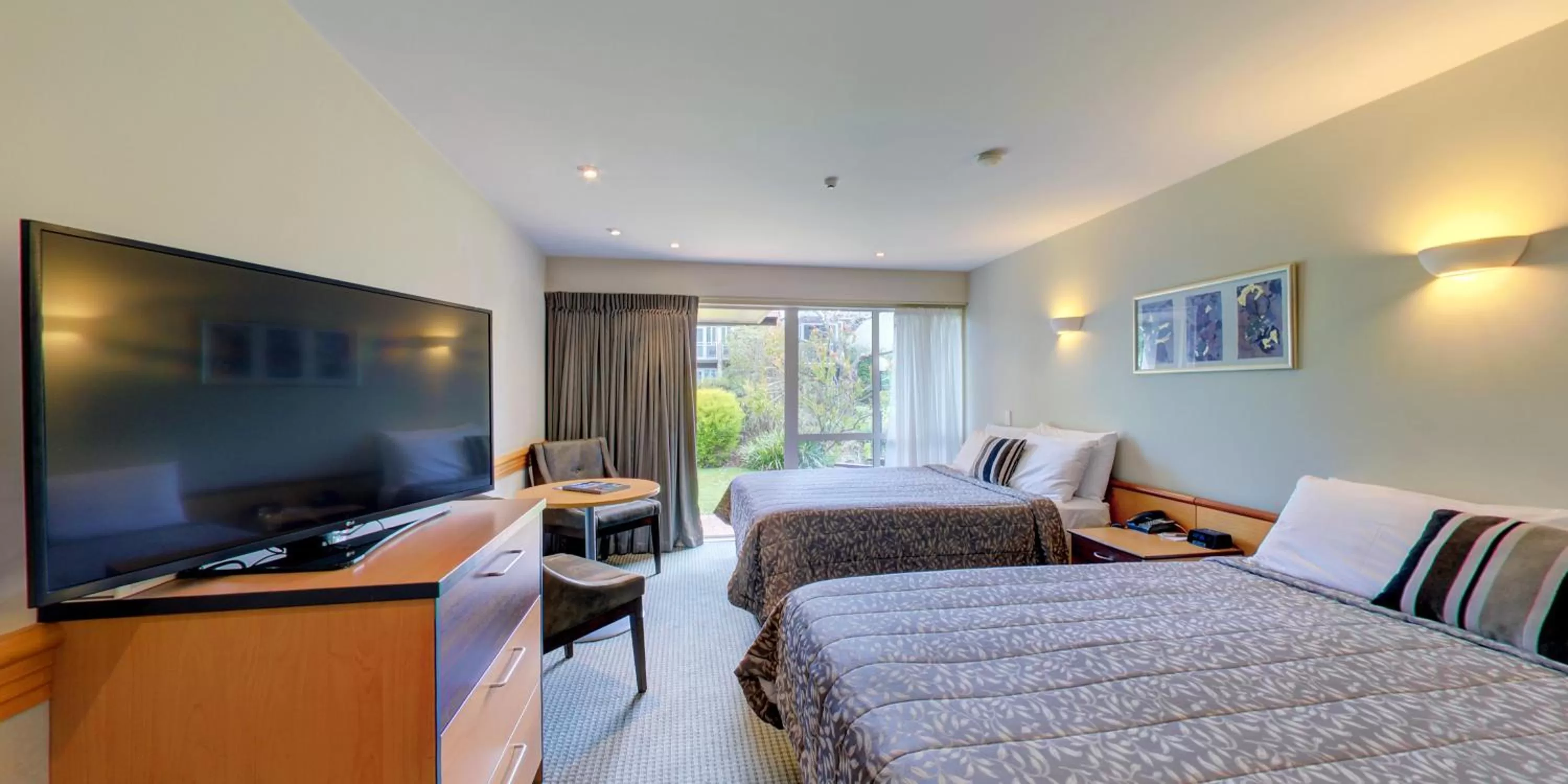 Bedroom, Bed in Dunedin Leisure Lodge - Distinction