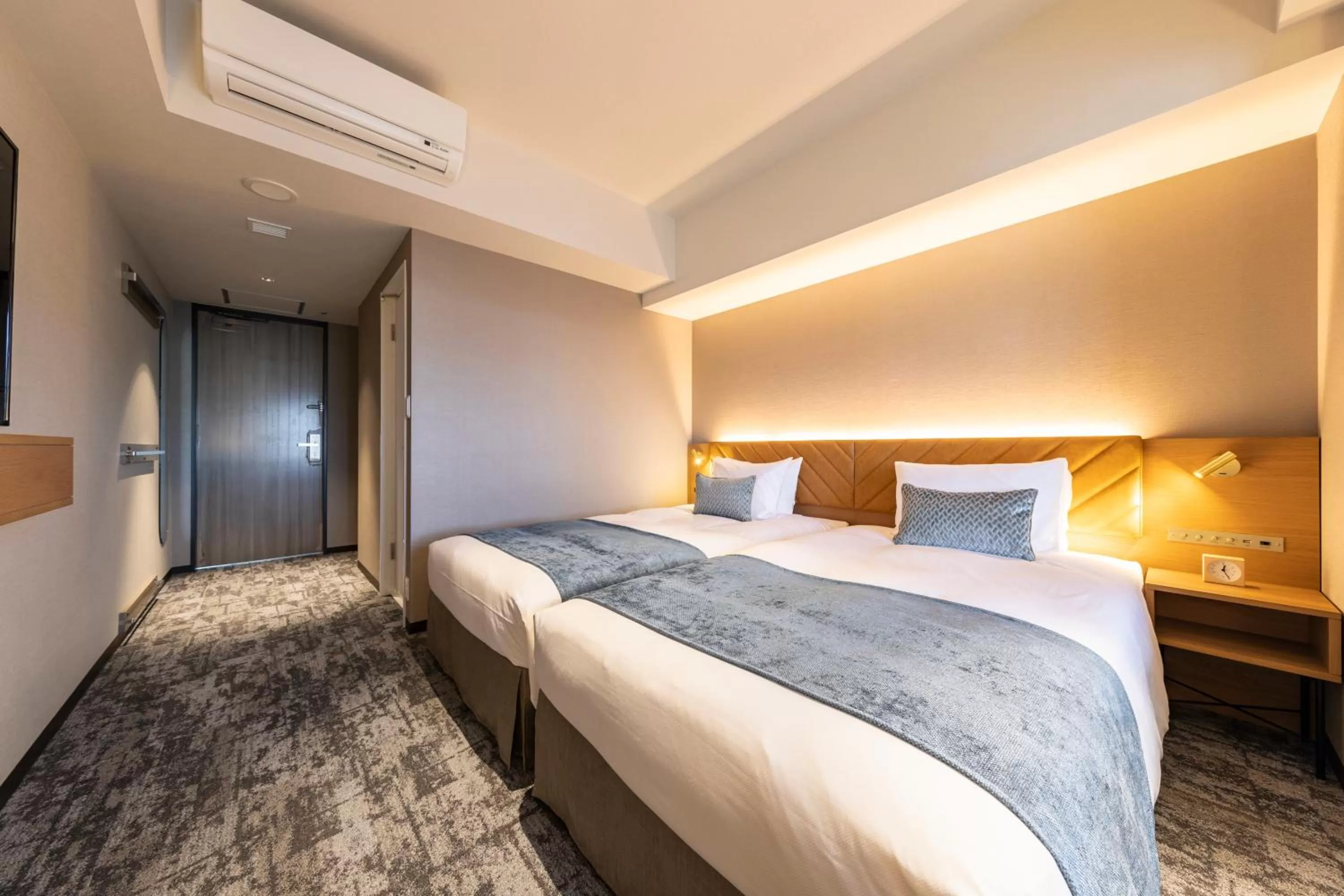 Bed in Tokyu Stay Hakodate Asaichi Akarinoyu