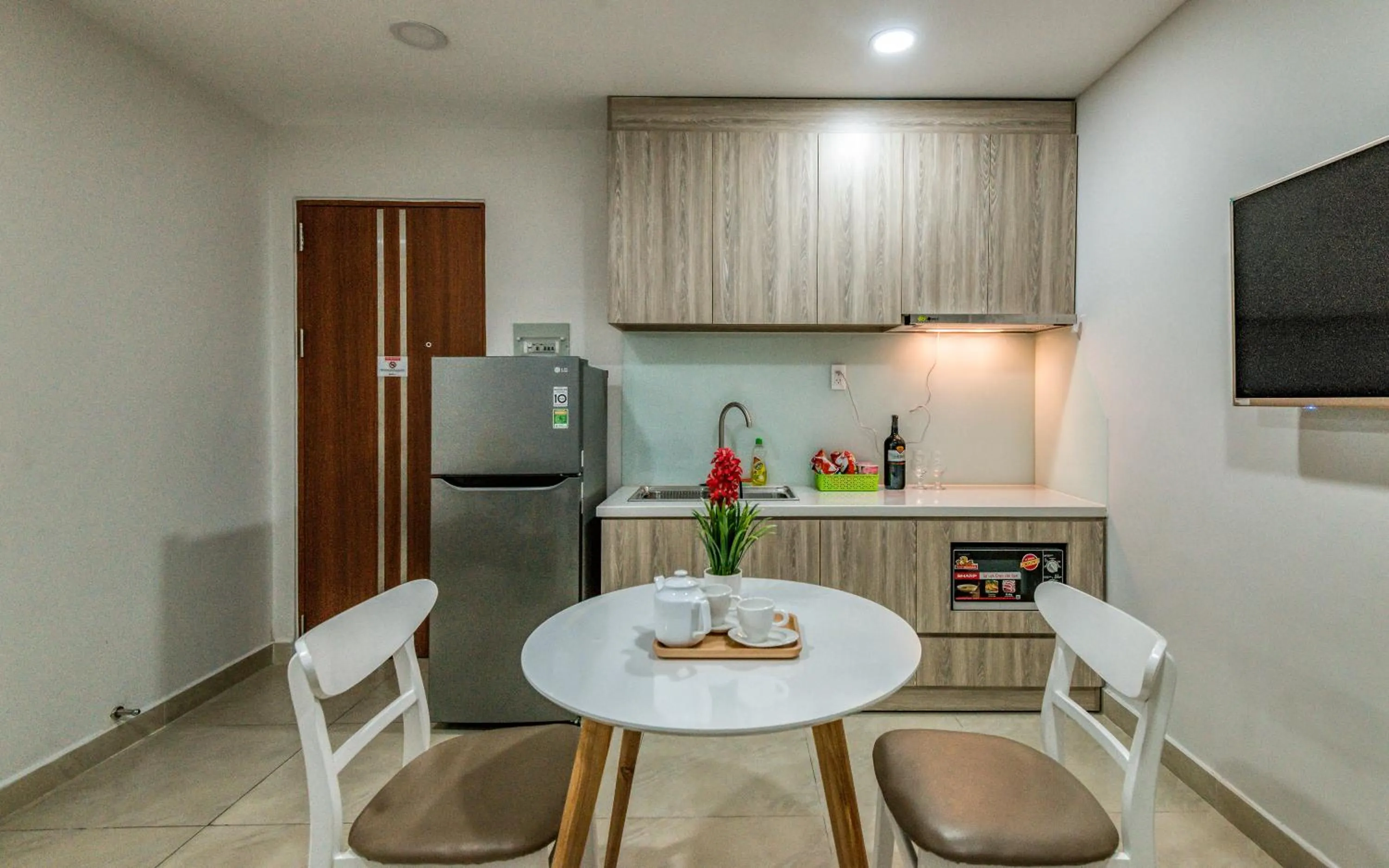 Kitchen or kitchenette in Cherry Hotel and Apartment