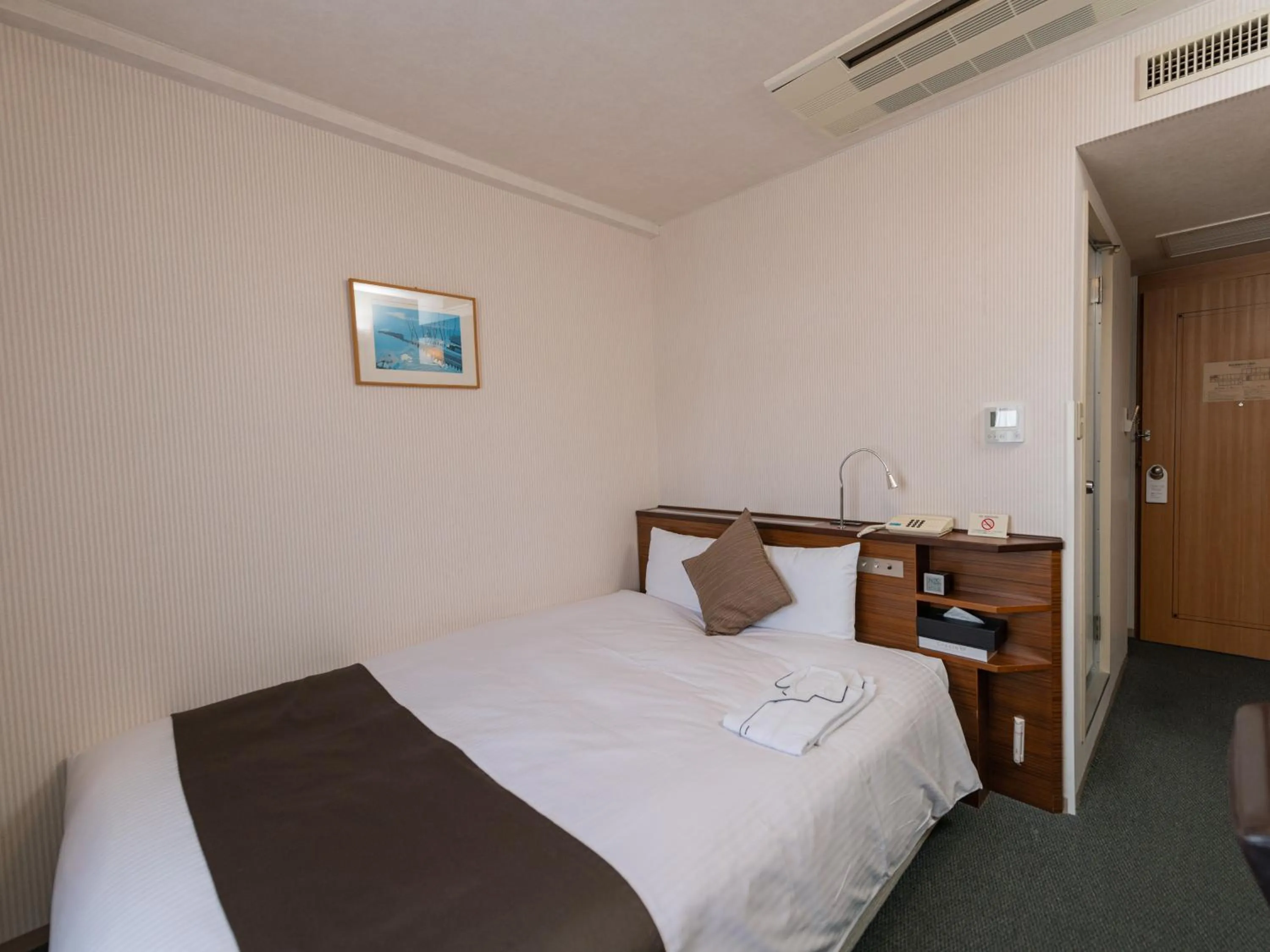 Bed in Alpico Plaza Hotel