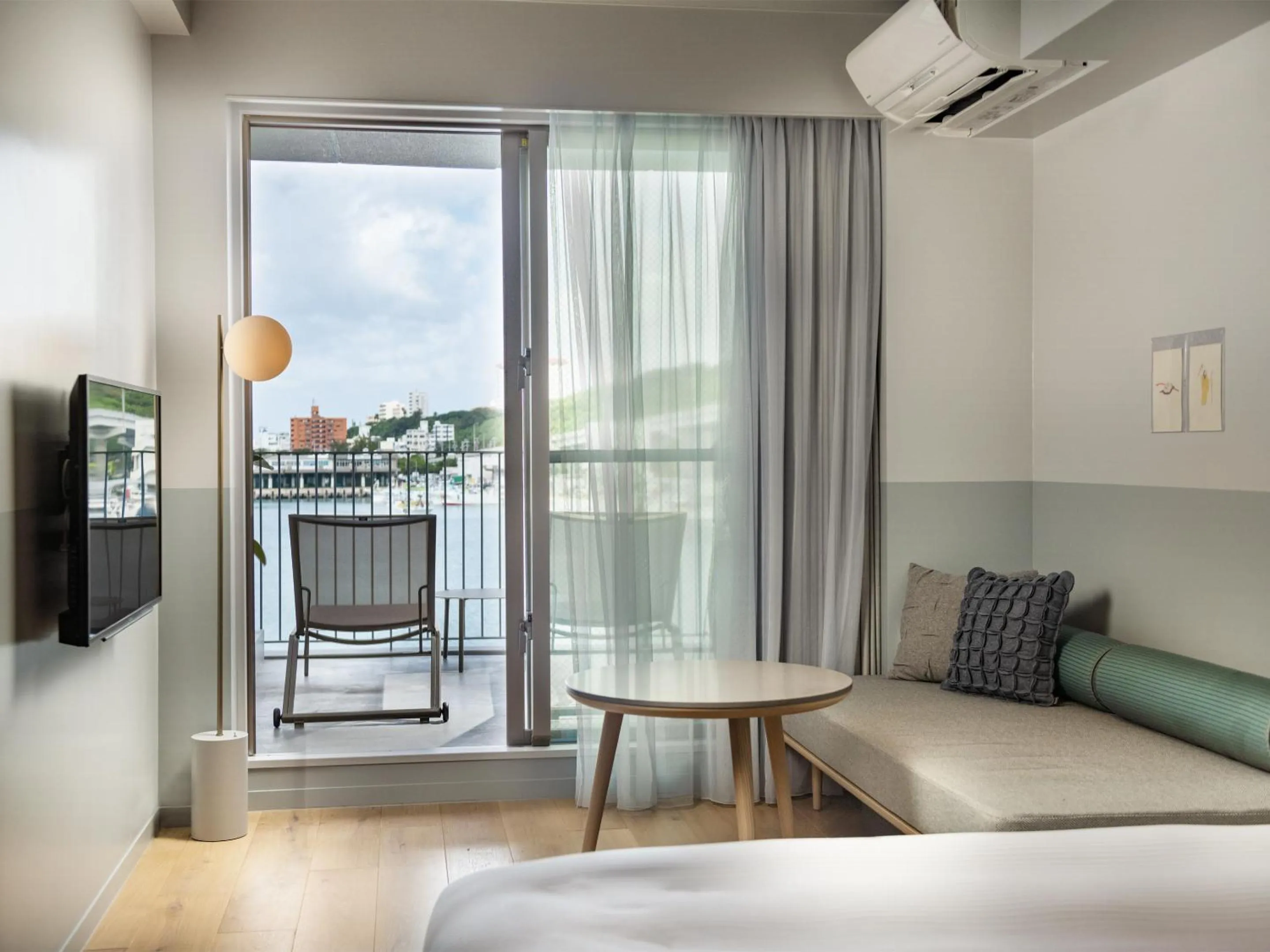 View (from property/room), Bed in HOTEL ANTEROOM NAHA