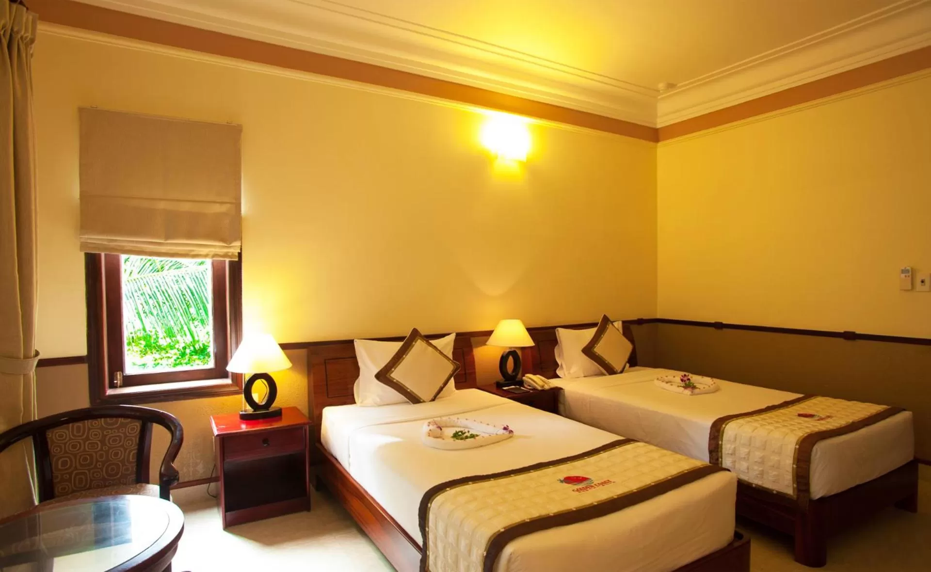 Bed in Golden Coast Resort & Spa