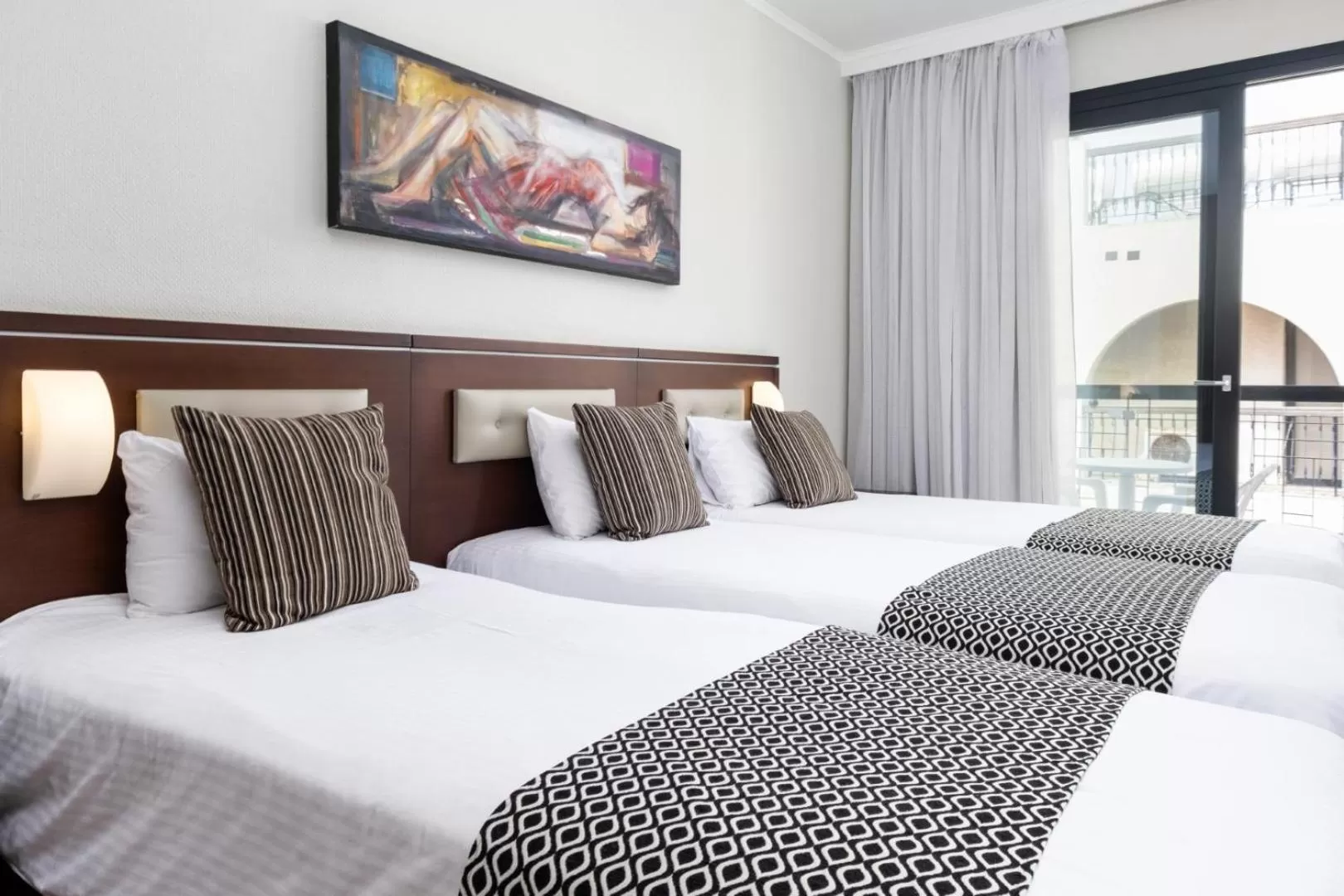 Bed in Livadhiotis City Hotel