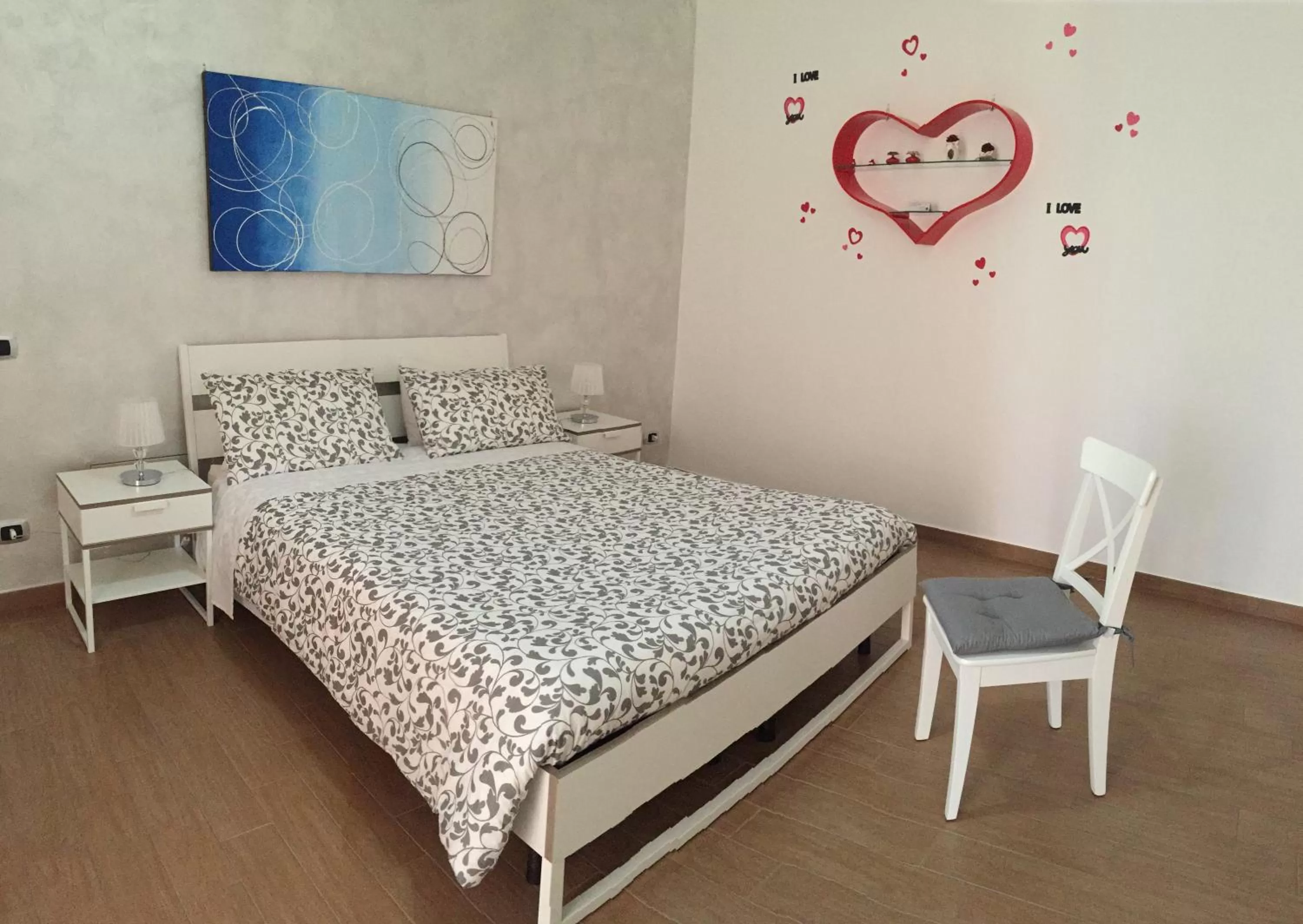 Photo of the whole room, Bed in La Rosa Blu 2