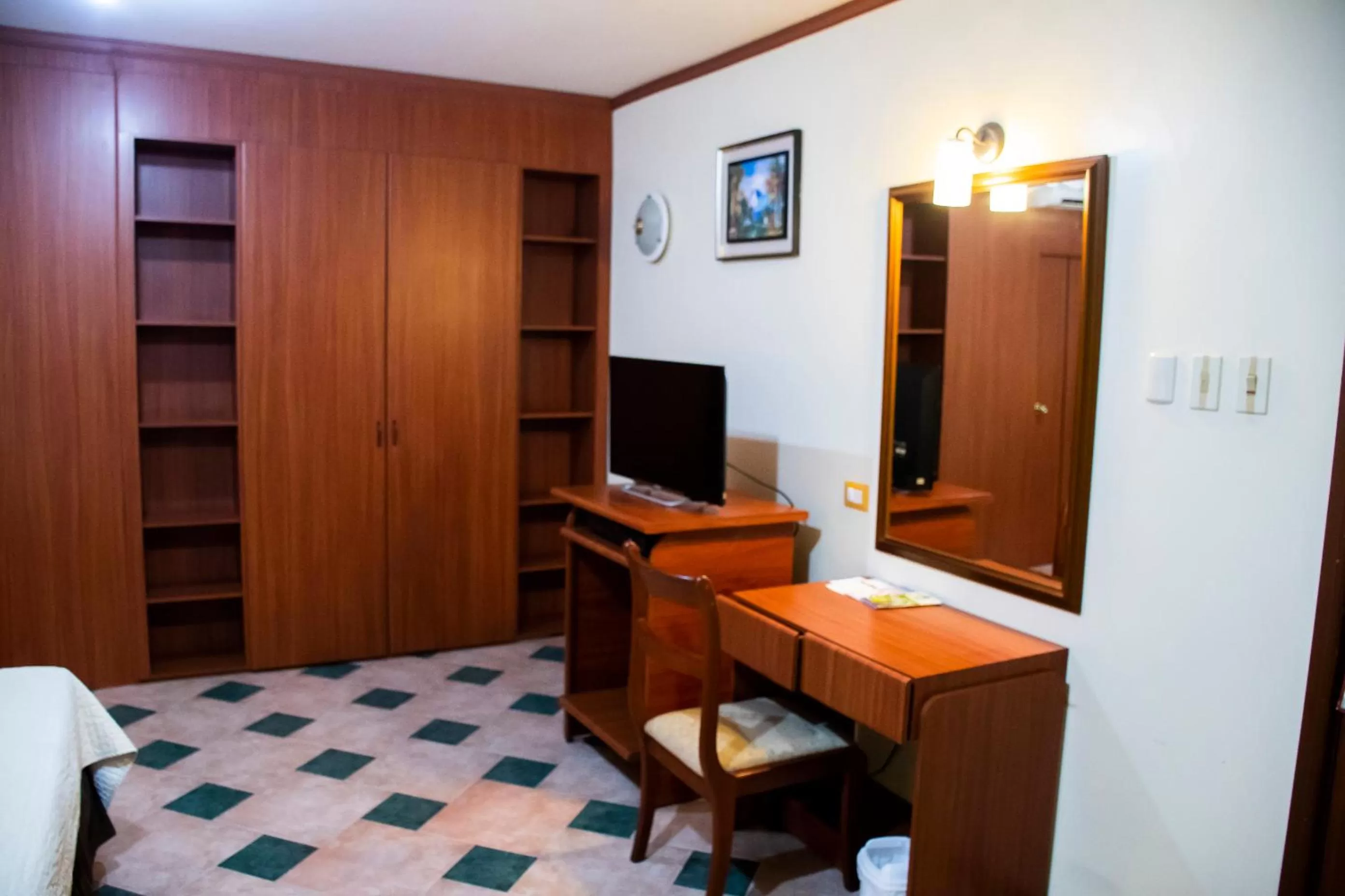 TV/Entertainment Center in REGAL HOTEL