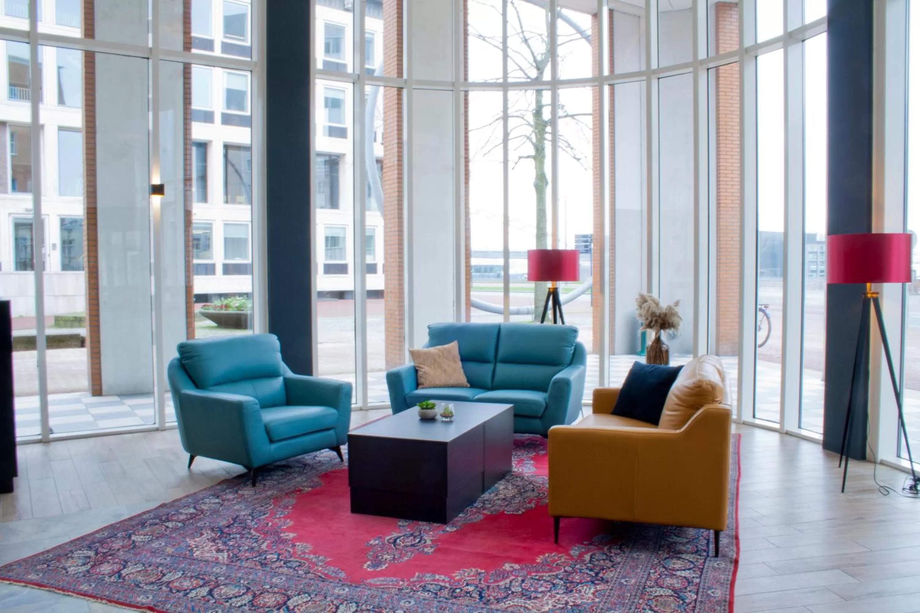 Communal lounge/ TV room in Bastion Hotel Arnhem