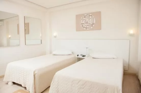 Bed in Hotel Concatto