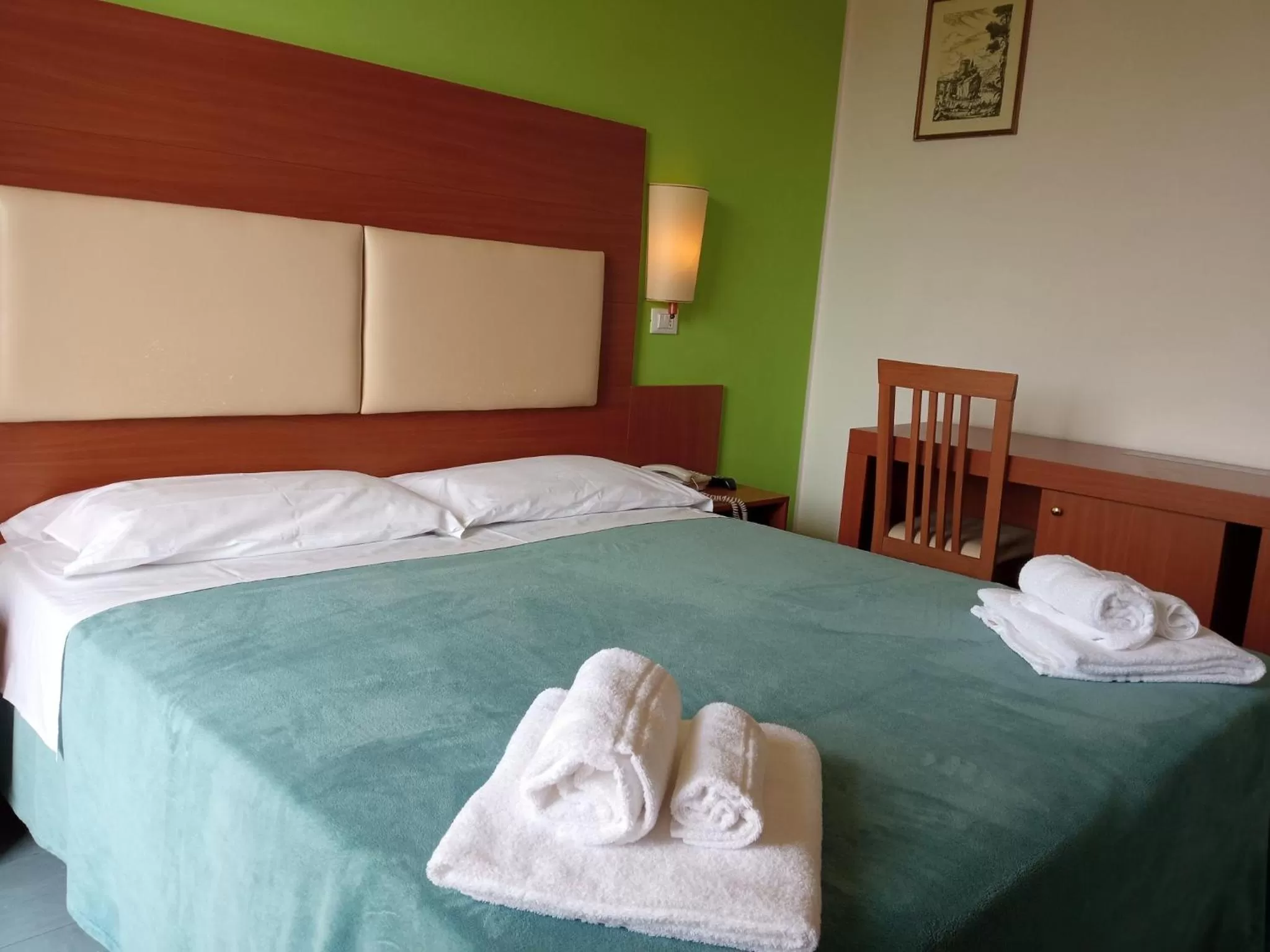 Bedroom, Bed in Base Hotel Helios Colazione disponibile fino alle 12