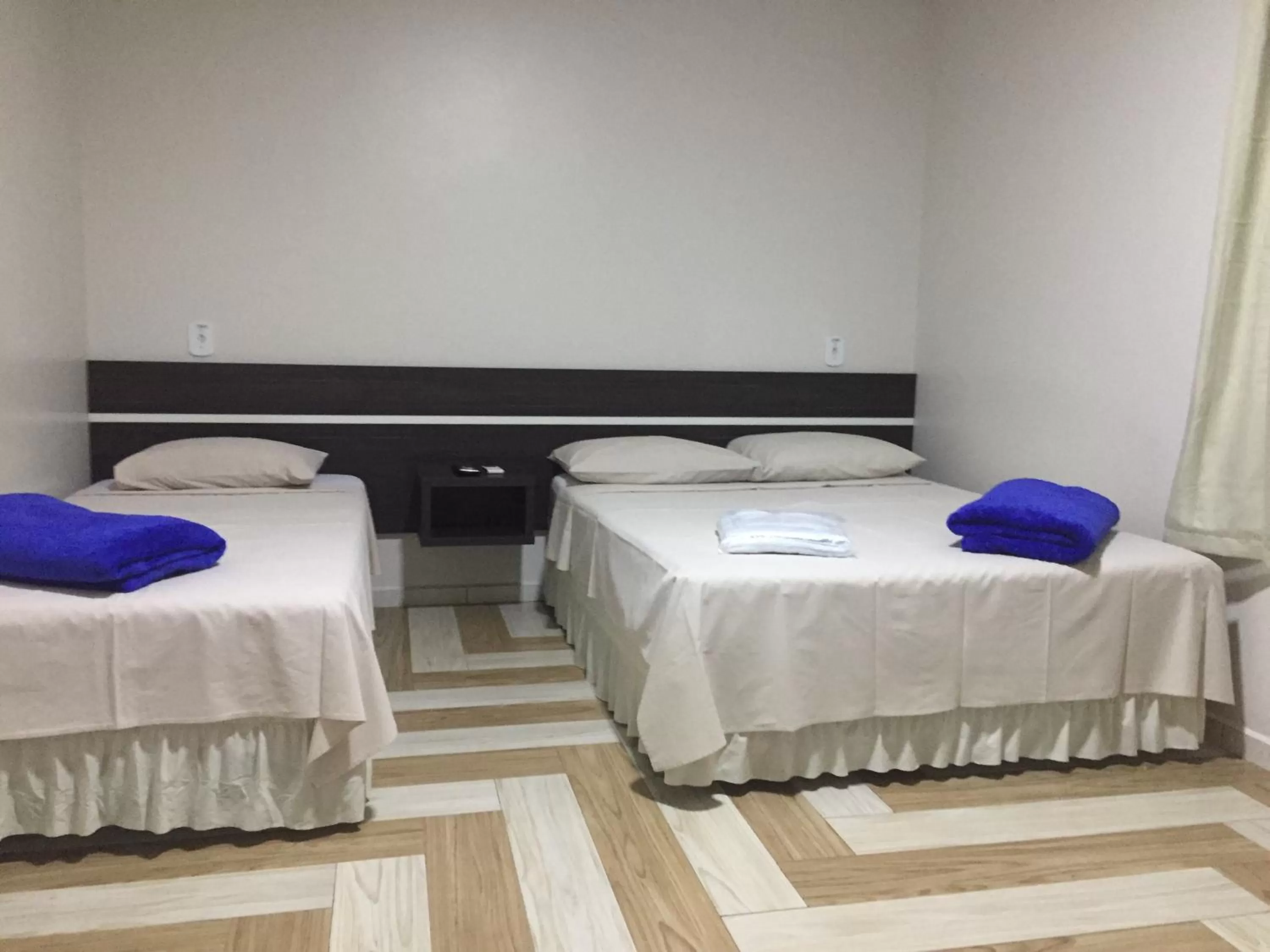 Bed in Hotel Paradizzo