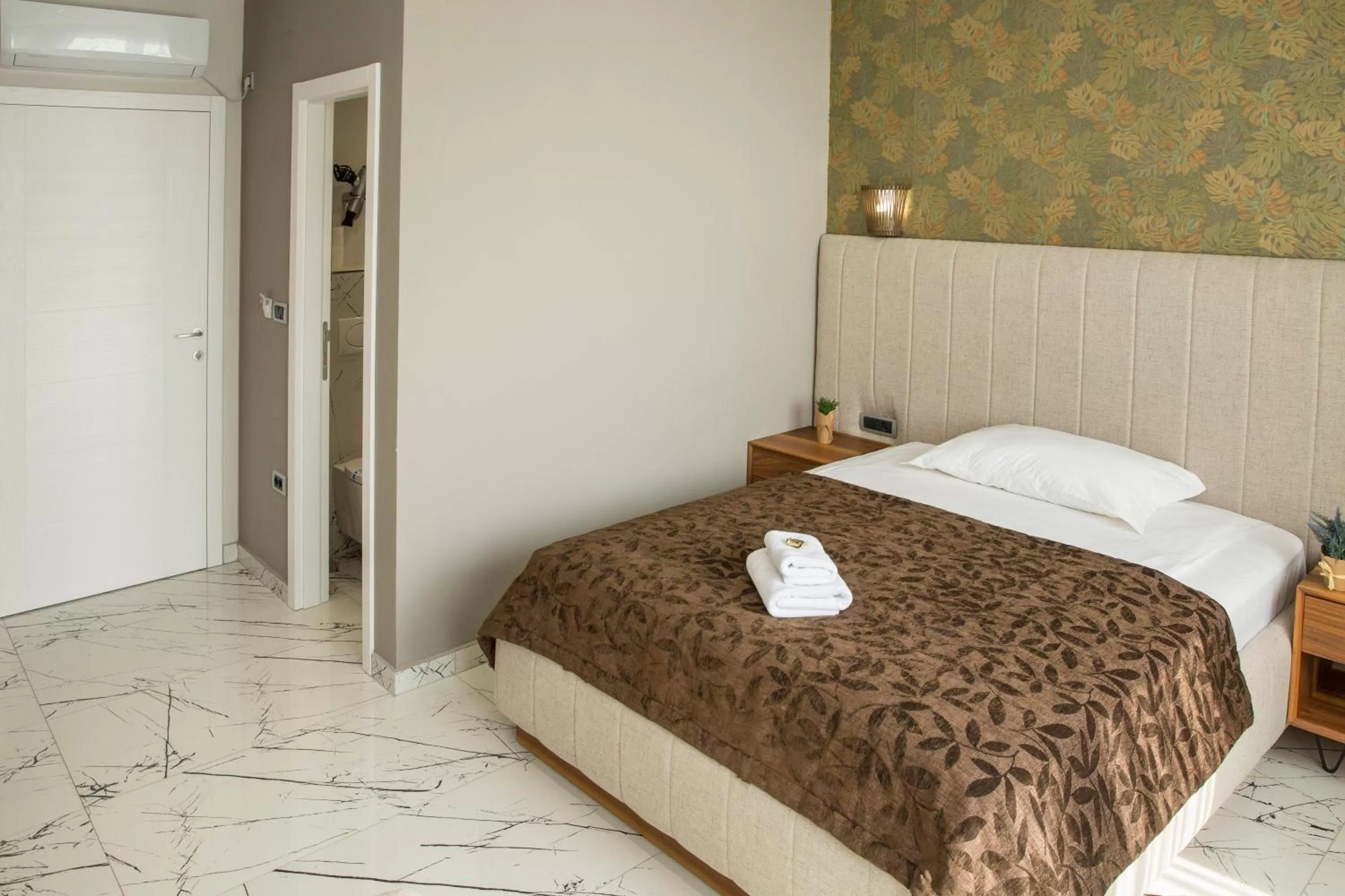 Bed in Garni Boutique Hotel Arta