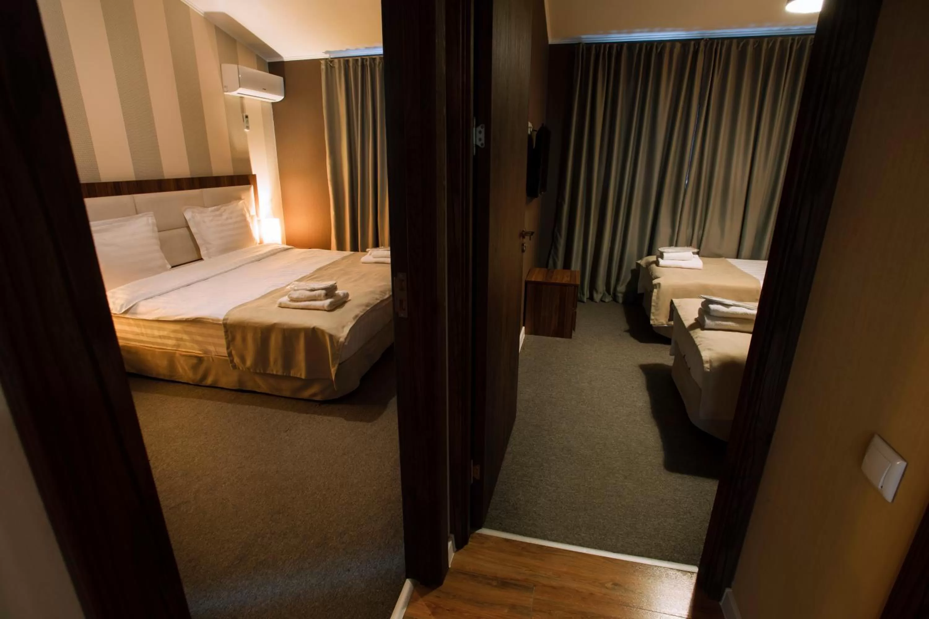 Bed in Apart Hotel West