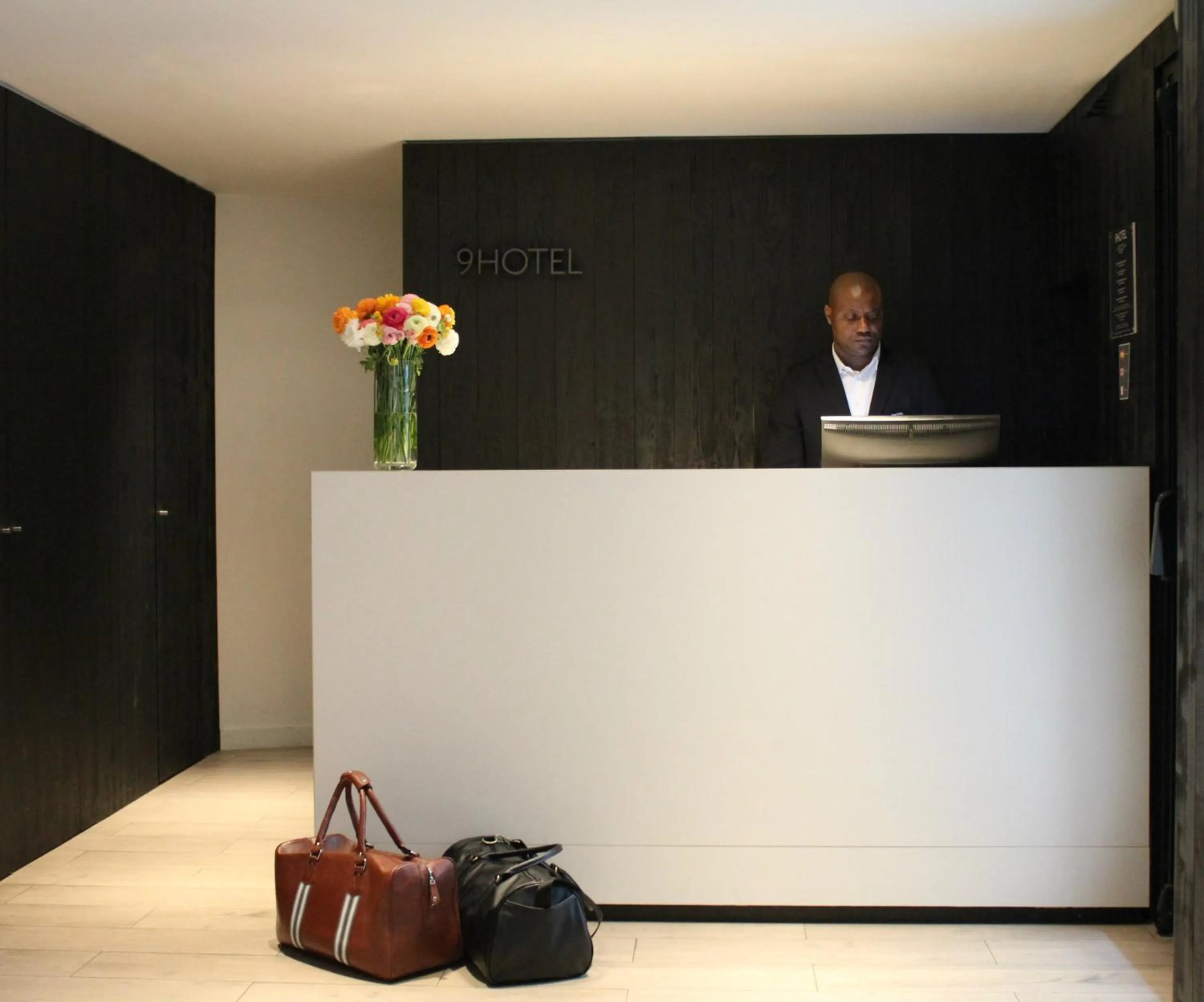 Property logo or sign in 9Hotel Opera