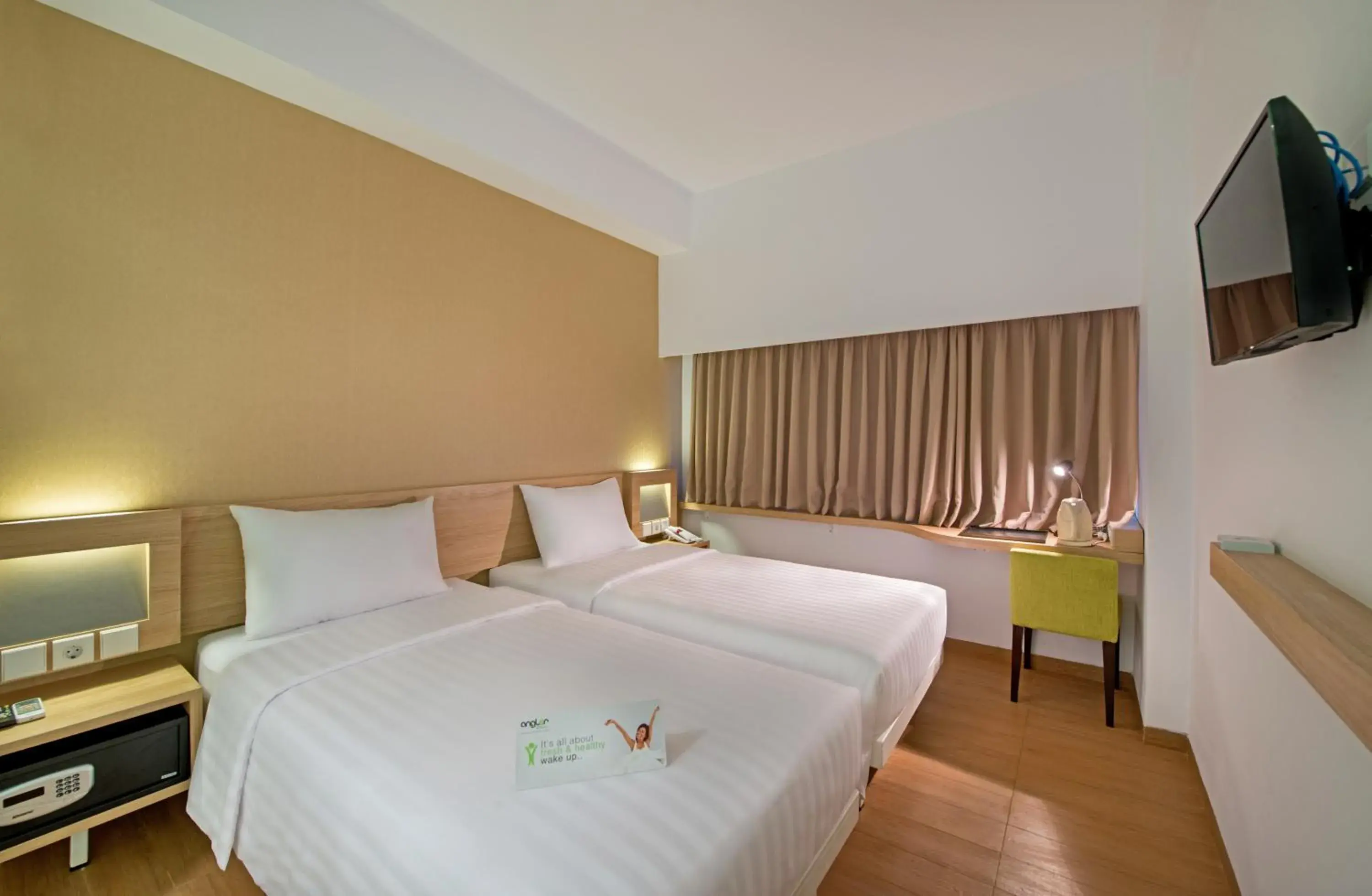 Whiz Twin Room in Whiz Prime Hotel Megamas Manado Whiz Twin Room in Whiz Prime Hotel Megamas Manado