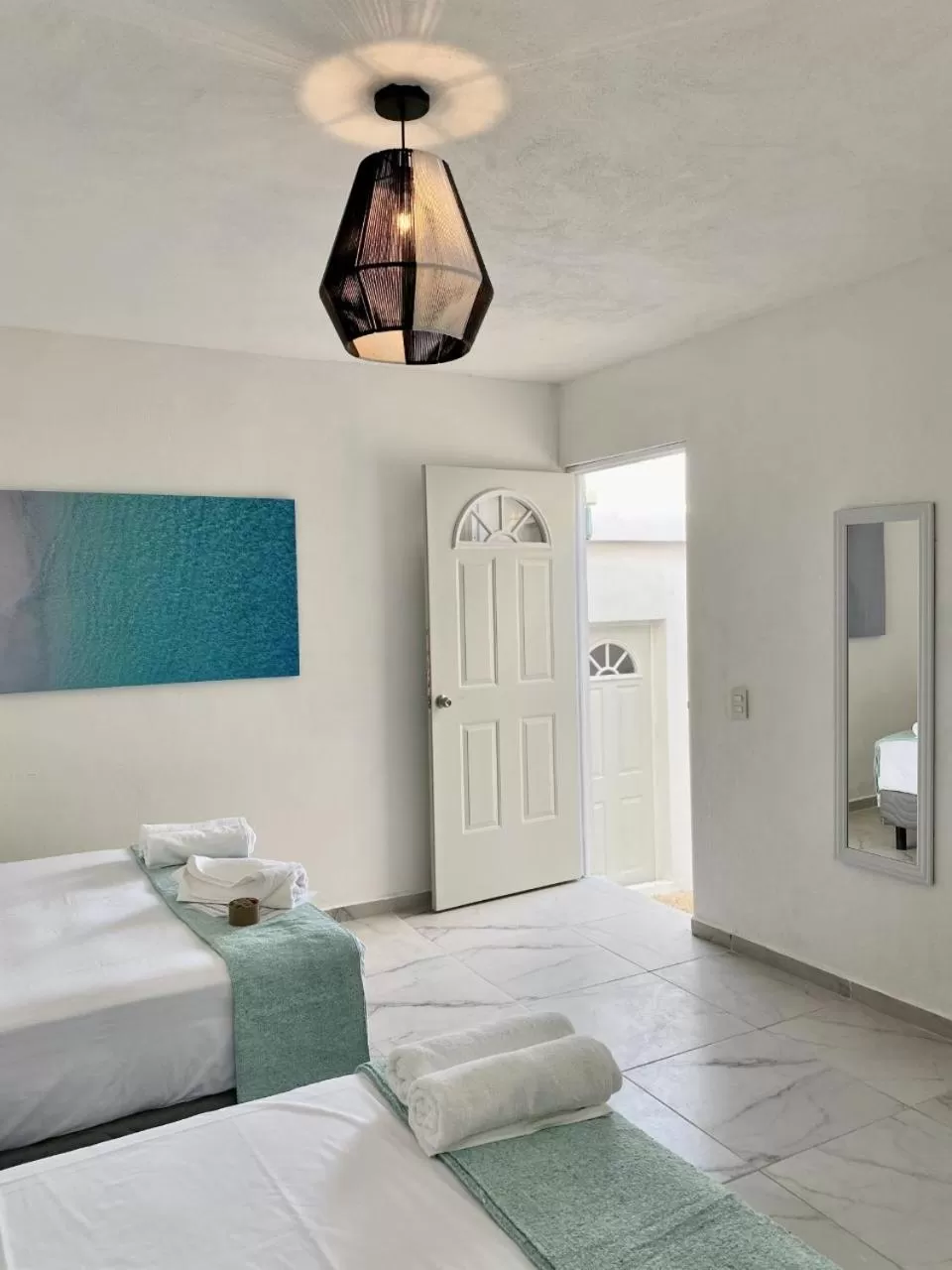 Bed in Casa Colibrí El Cuyo