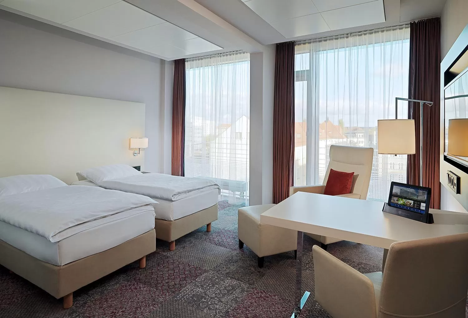 Photo of the whole room, Bed in Radisson Blu Hotel Leipzig
