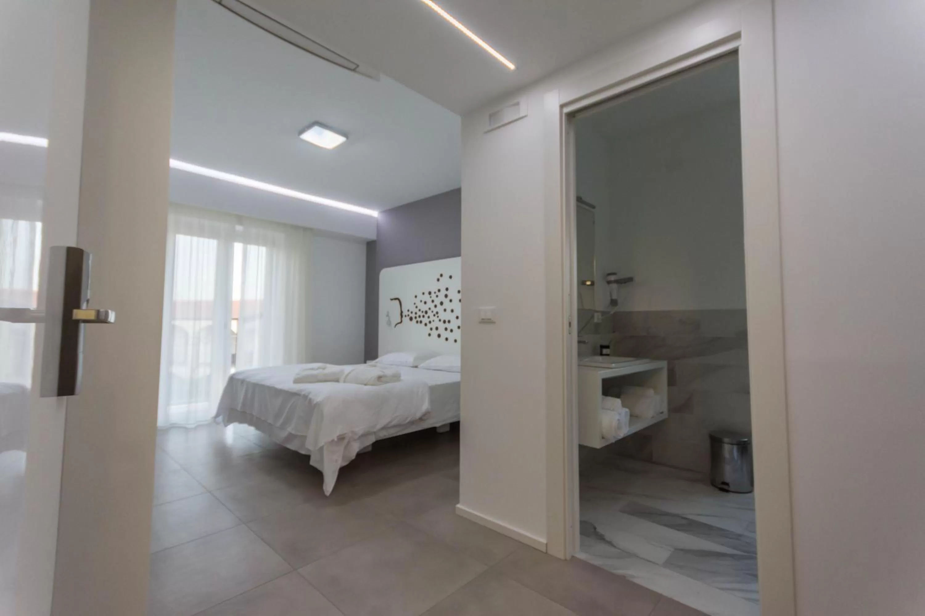Photo of the whole room, Bed in Aether Suites Tropea - Free Private Parking
