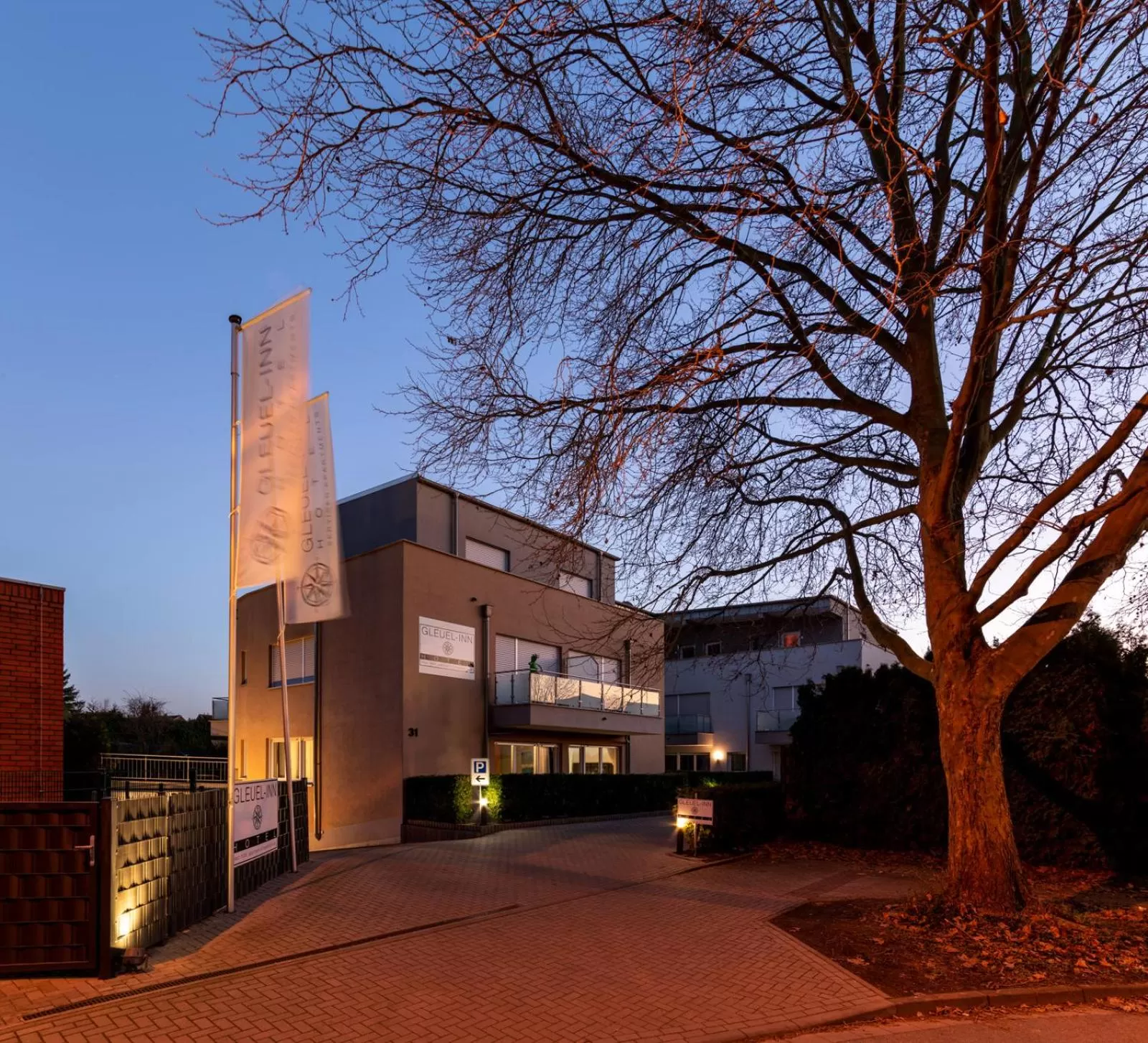 Property Building in GLEUEL INN - digital hotel & serviced apartments & boardinghouse mit voll ausgestatteten Küchen