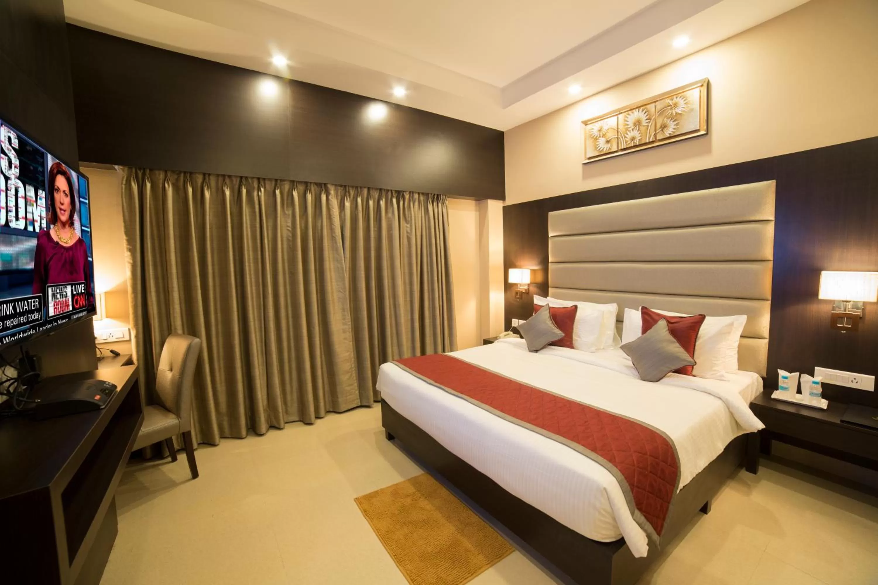 Photo of the whole room, Bed in Golden Tulip Saltlake Kolkata