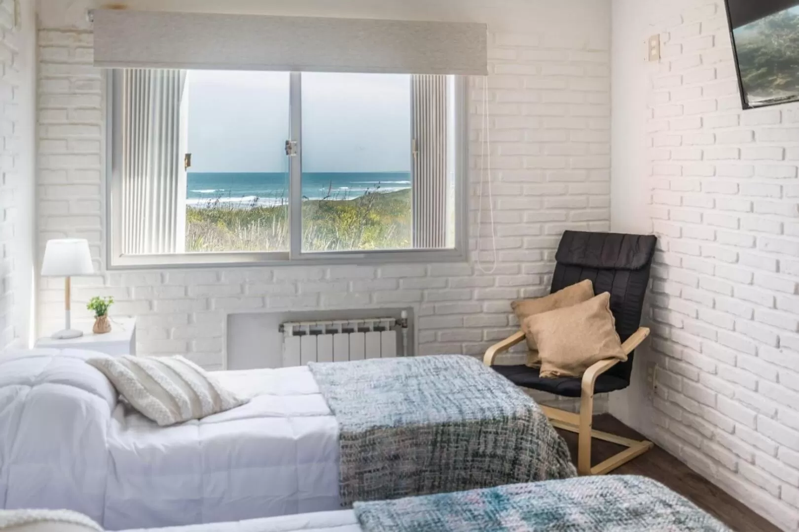 Bed in Portobello Suites Hotel