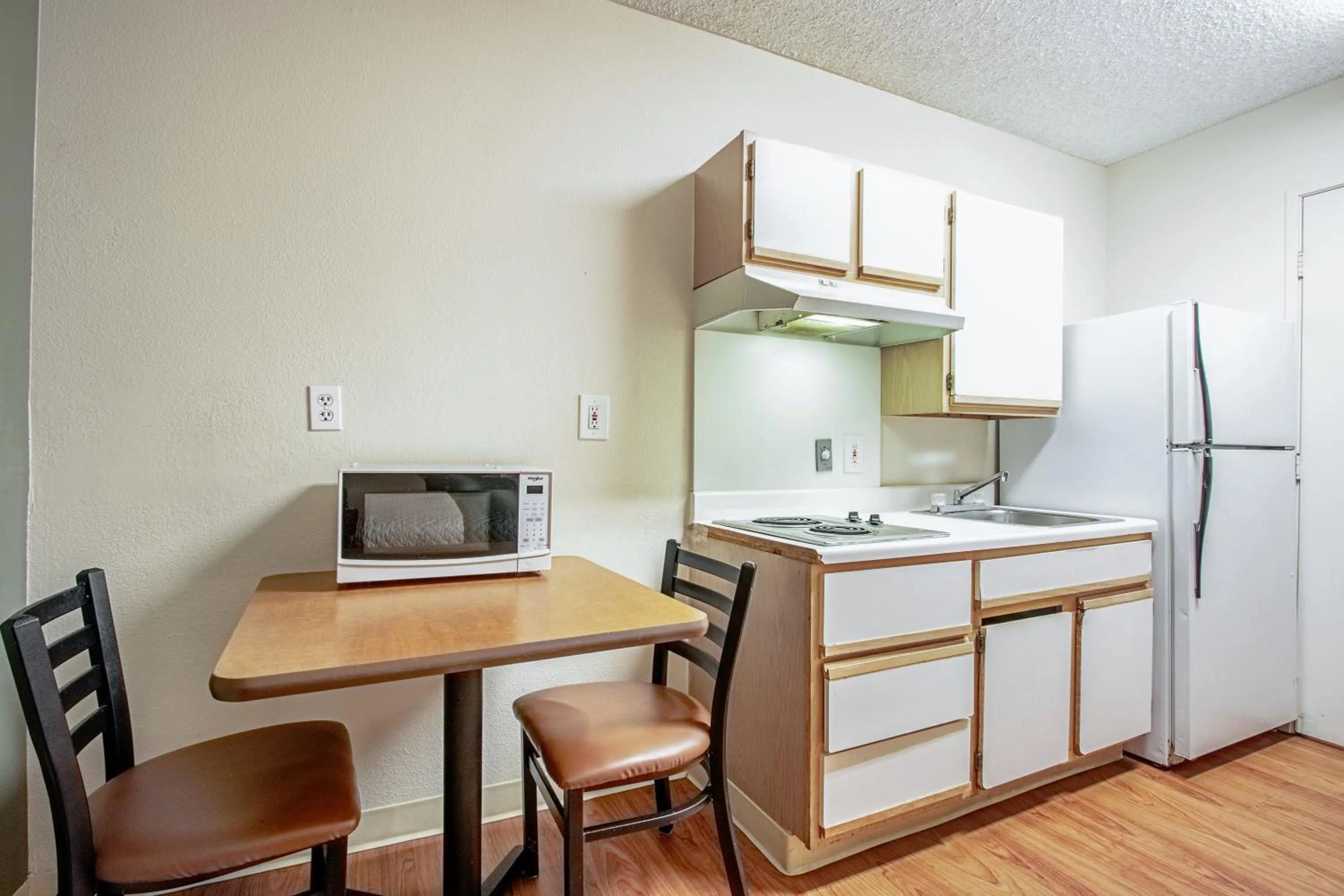 Photo of the whole room in HomeTowne Studios by Red Roof Phoenix - Black Canyon Highway